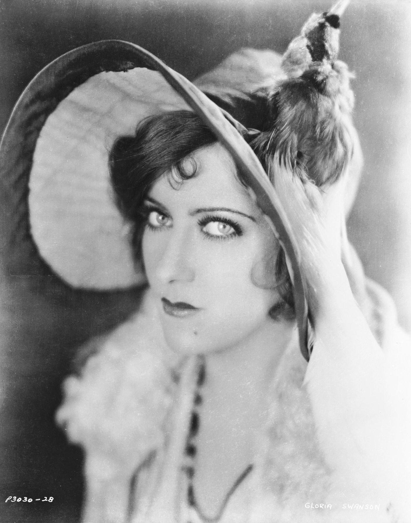 Gloria Swanson Wearing An Extravagantly Feathered Hat, Circa 1930.