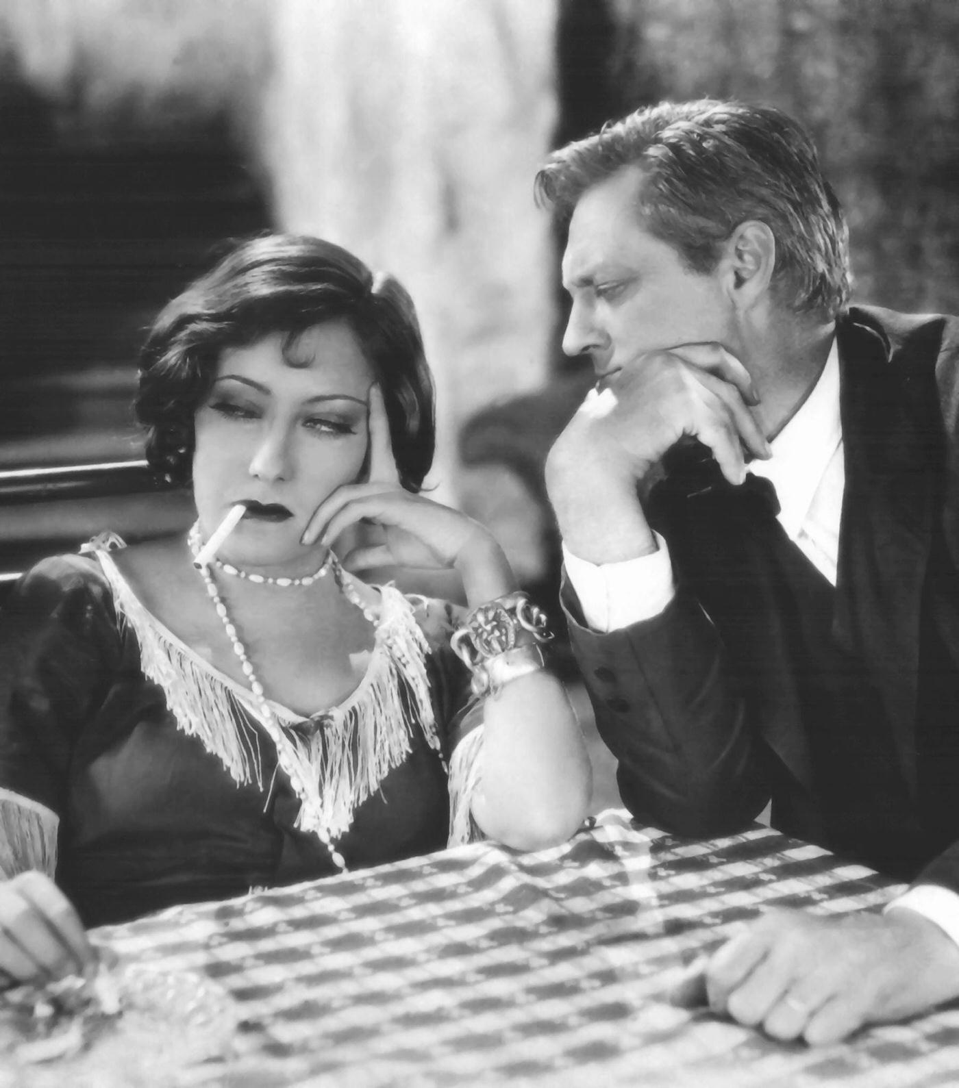 Gloria Swanson And Actor Lionel Barrymore On The Set Of Sadie Thompson, Directed By Raoul Walsh.