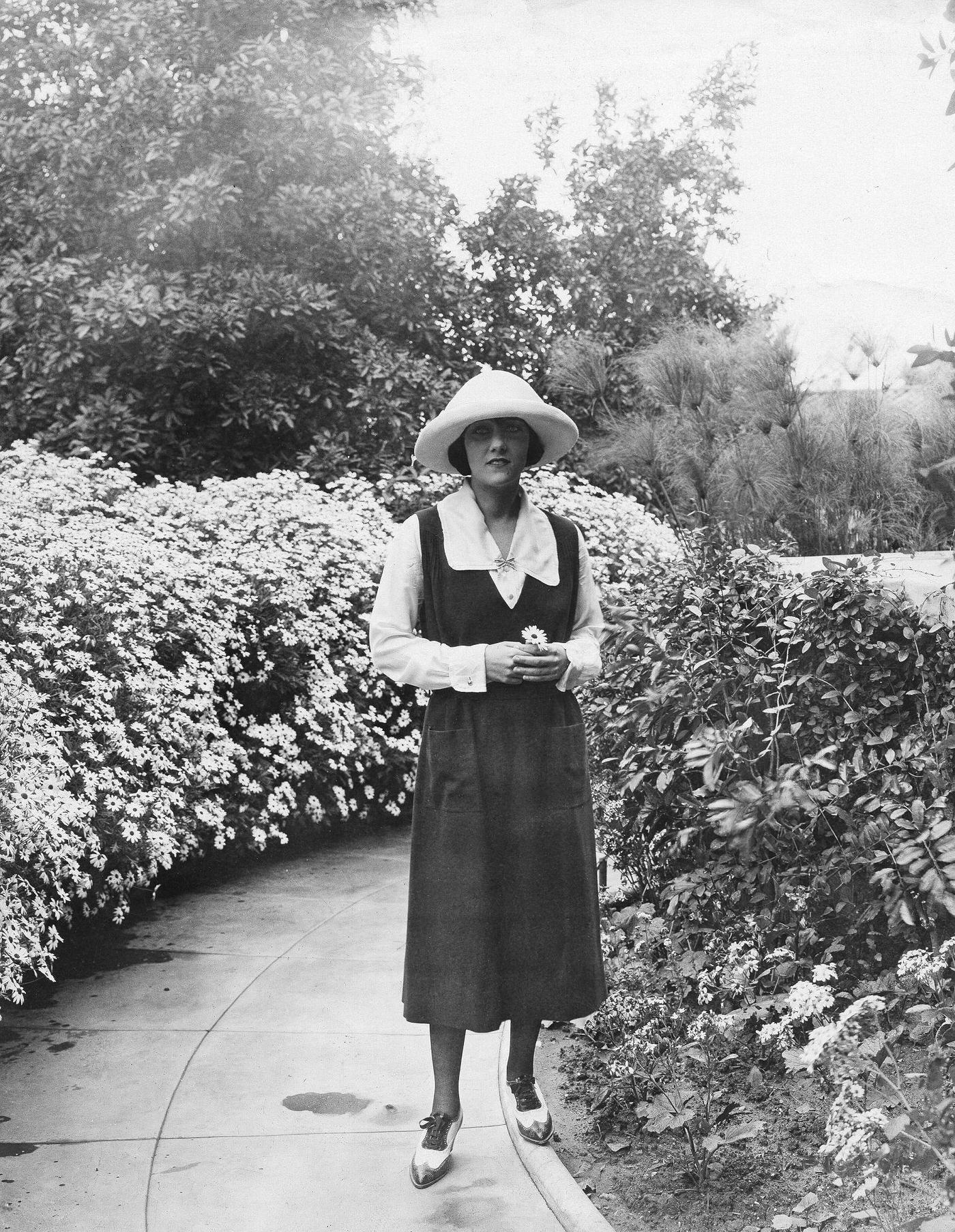 Gloria Swanson In A Garden Wearing A Dress, 1922.
