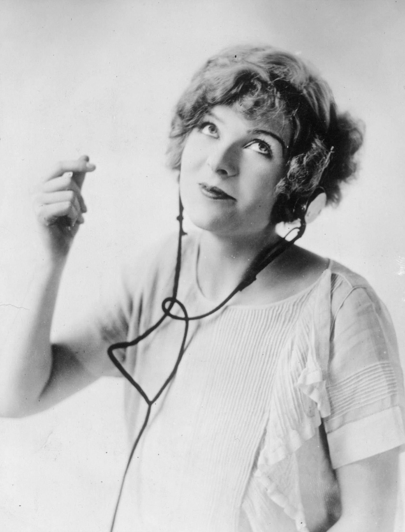 Gloria Swanson Listens With Headphones, Circa 1925.