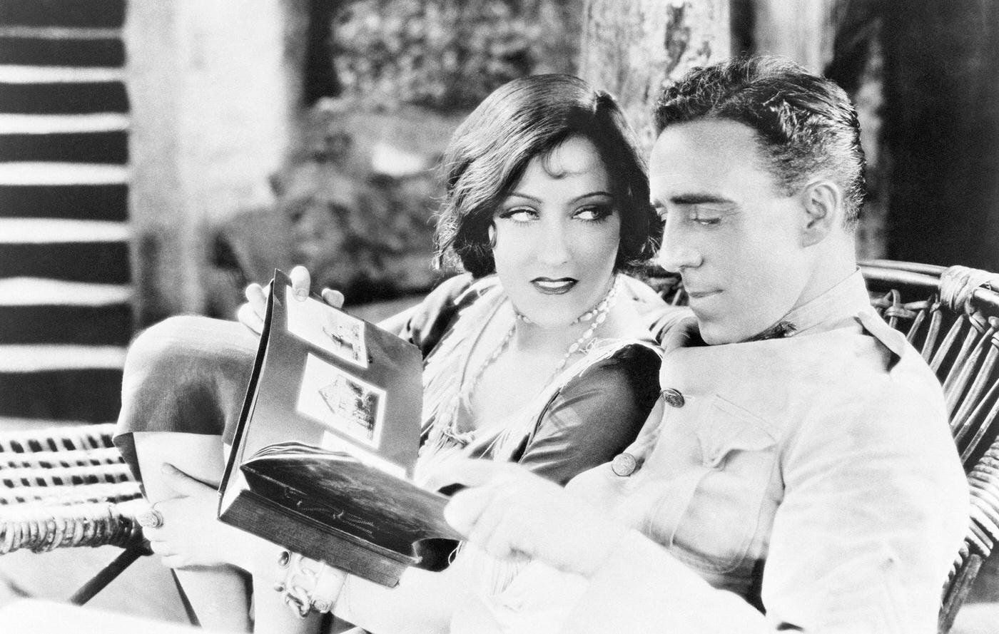 Gloria Swanson Pays Attention To Director Raoul Walsh During Filming Of &Amp;Quot;Sadie Thompson,&Amp;Quot; 1928.