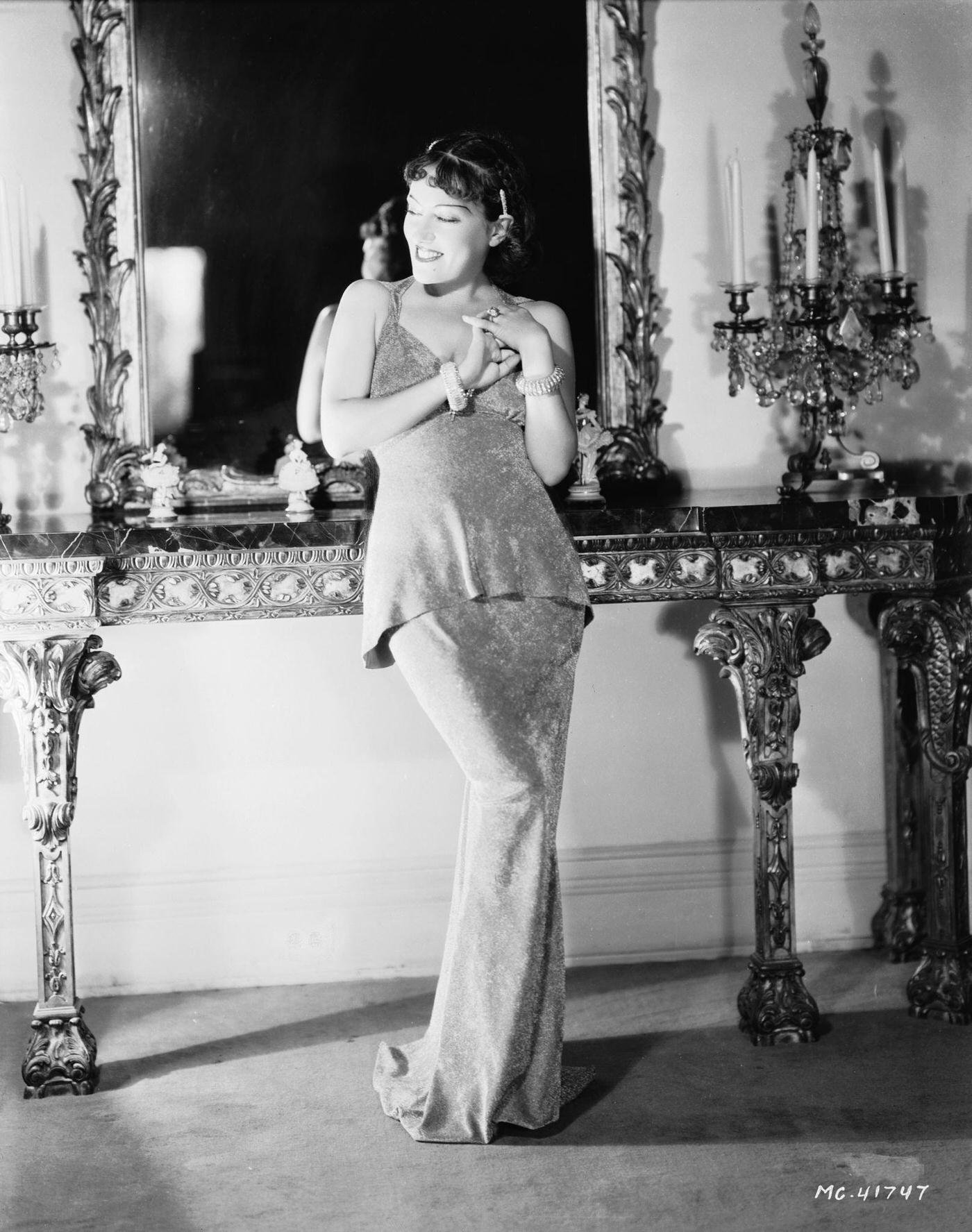 Gloria Swanson Leans Against An Ornate Mantelpiece, 21St September 1934.