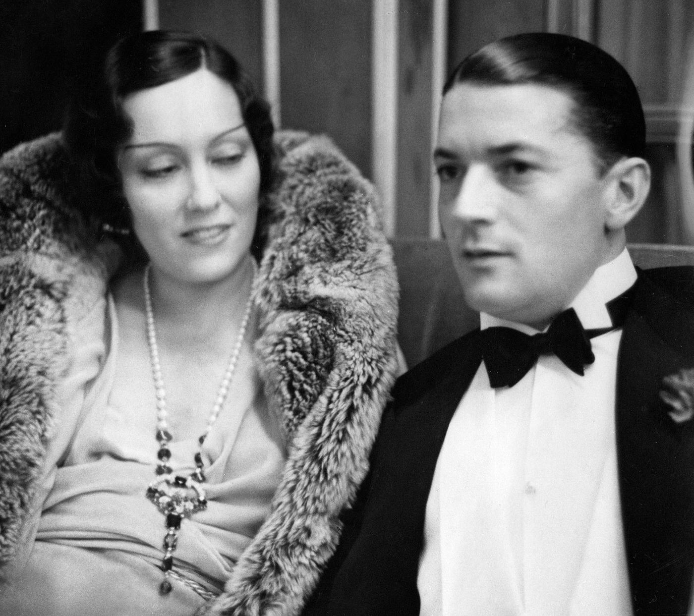 Gloria Swanson With Her Husband Michael Farmer At A Ball In St. Moritz, 1933.