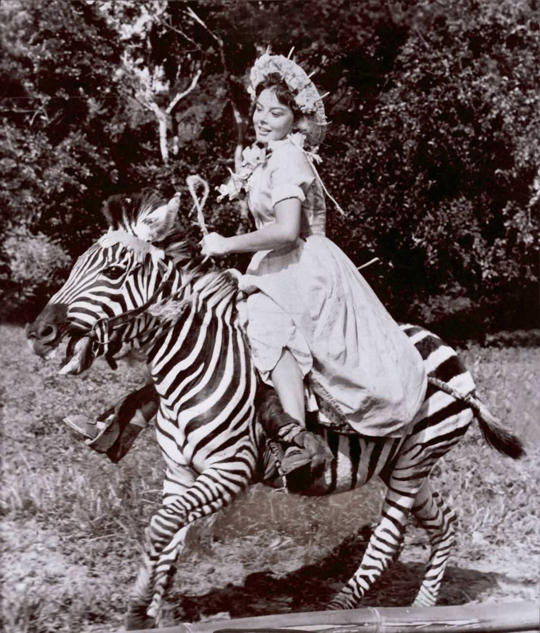 Janet Munro Riding A Zebra.