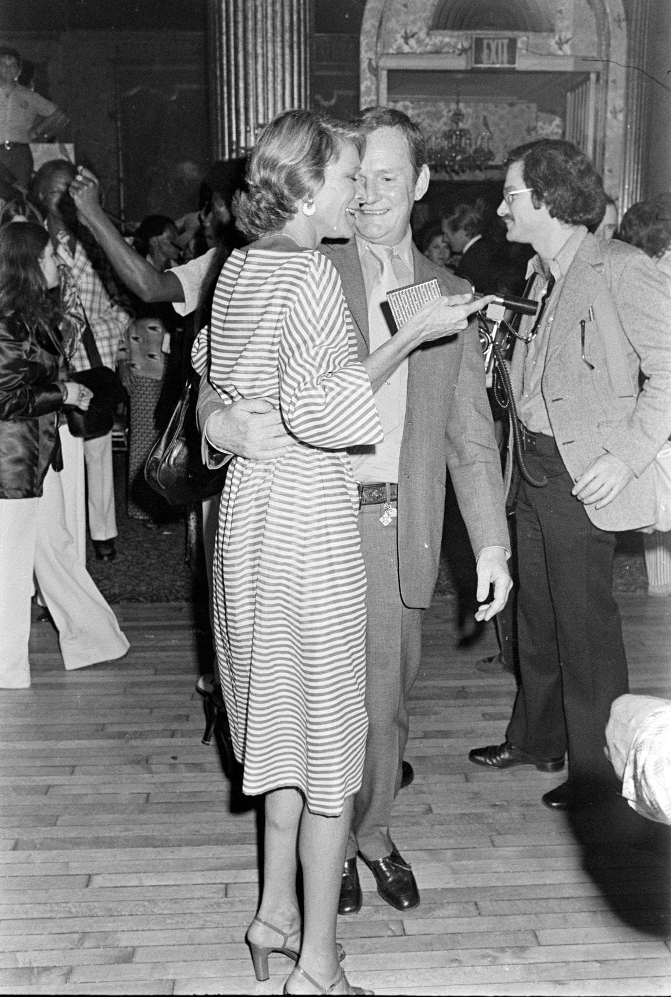 Patrick O'Higgins (C) Embraces Nan Kemper At Reception, Waldorf-Astoria Hotel, 1974