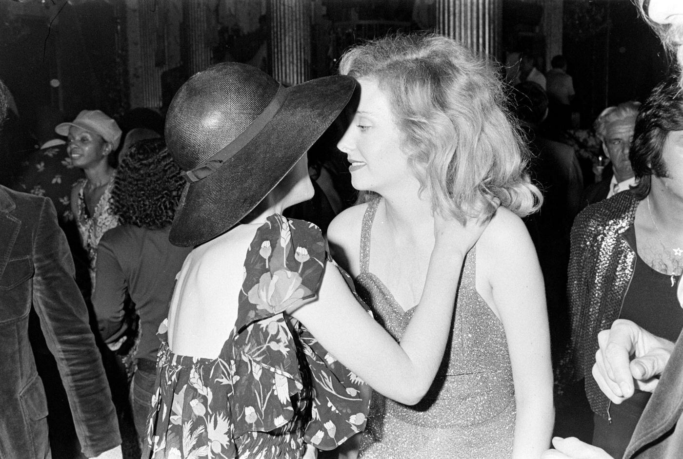 Loulou De La Falaise (C, Wearing Hat, Face Obscured) At Reception, 1974
