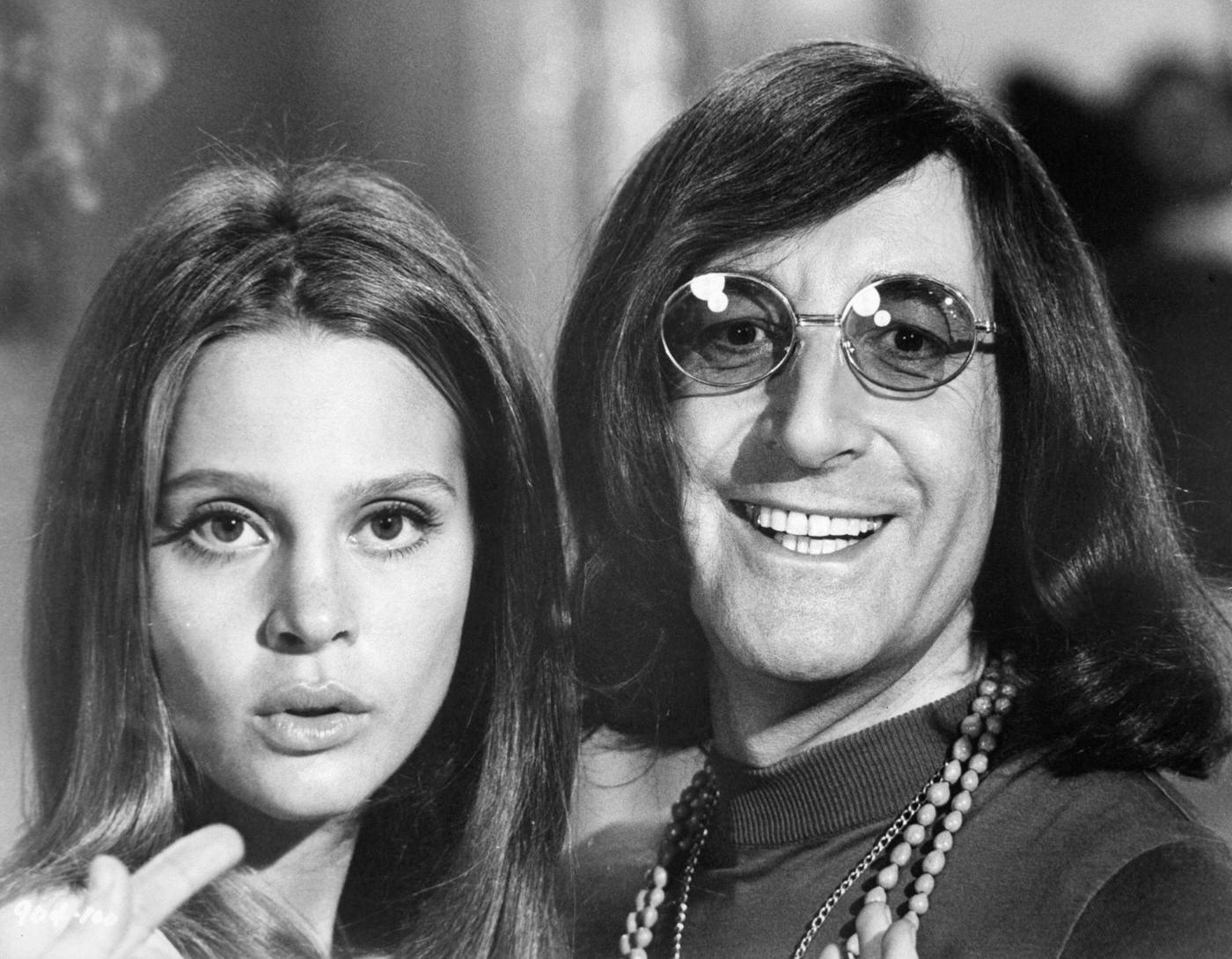 Leigh Taylor-Young Flashes Finger Signs To Peter Sellers In 'I Love You, Alice B. Toklas!,' 1968.