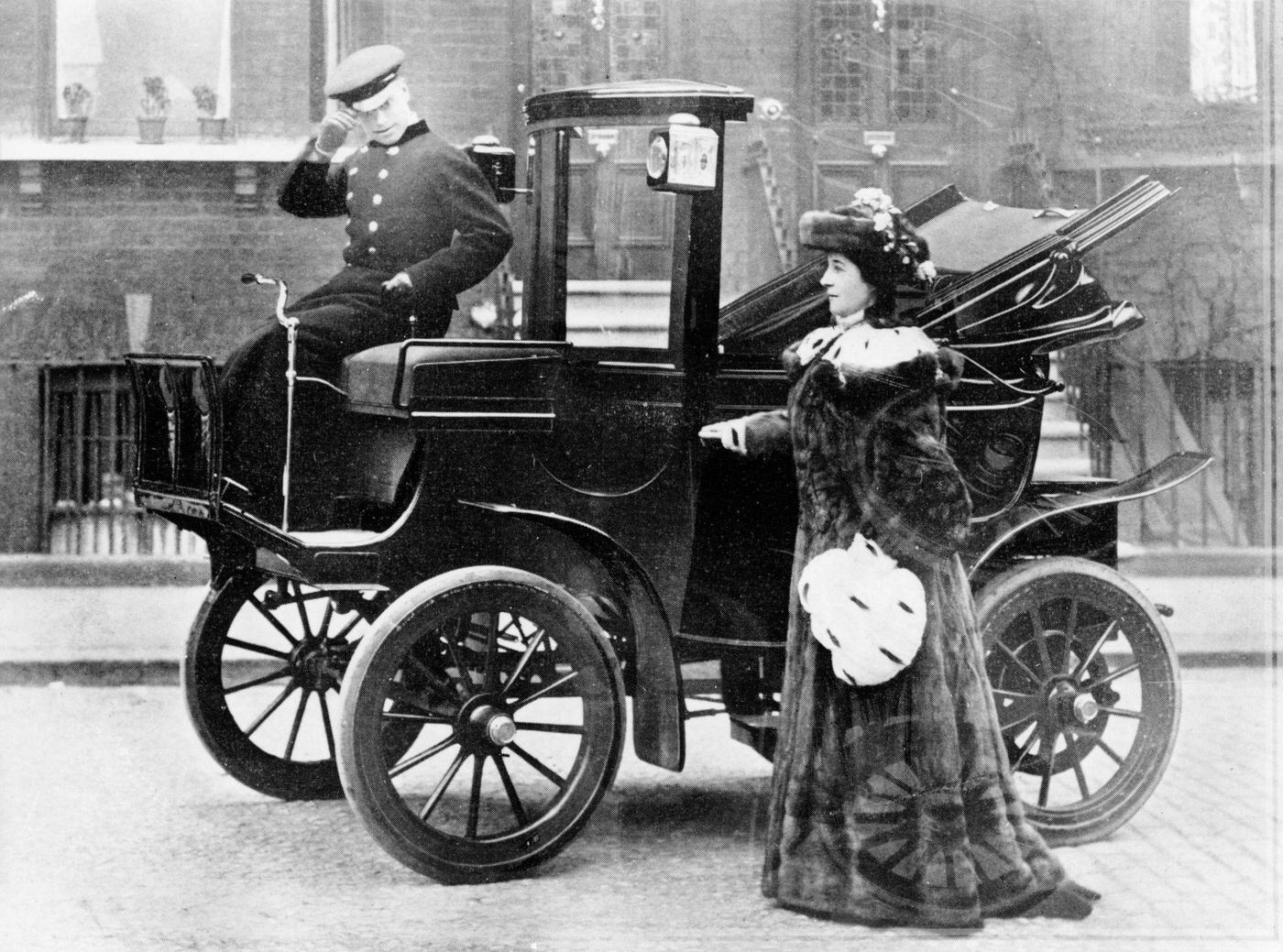 Lillie Langtry Models Sable Motoring Coat Beside An Electric Car, 1900.