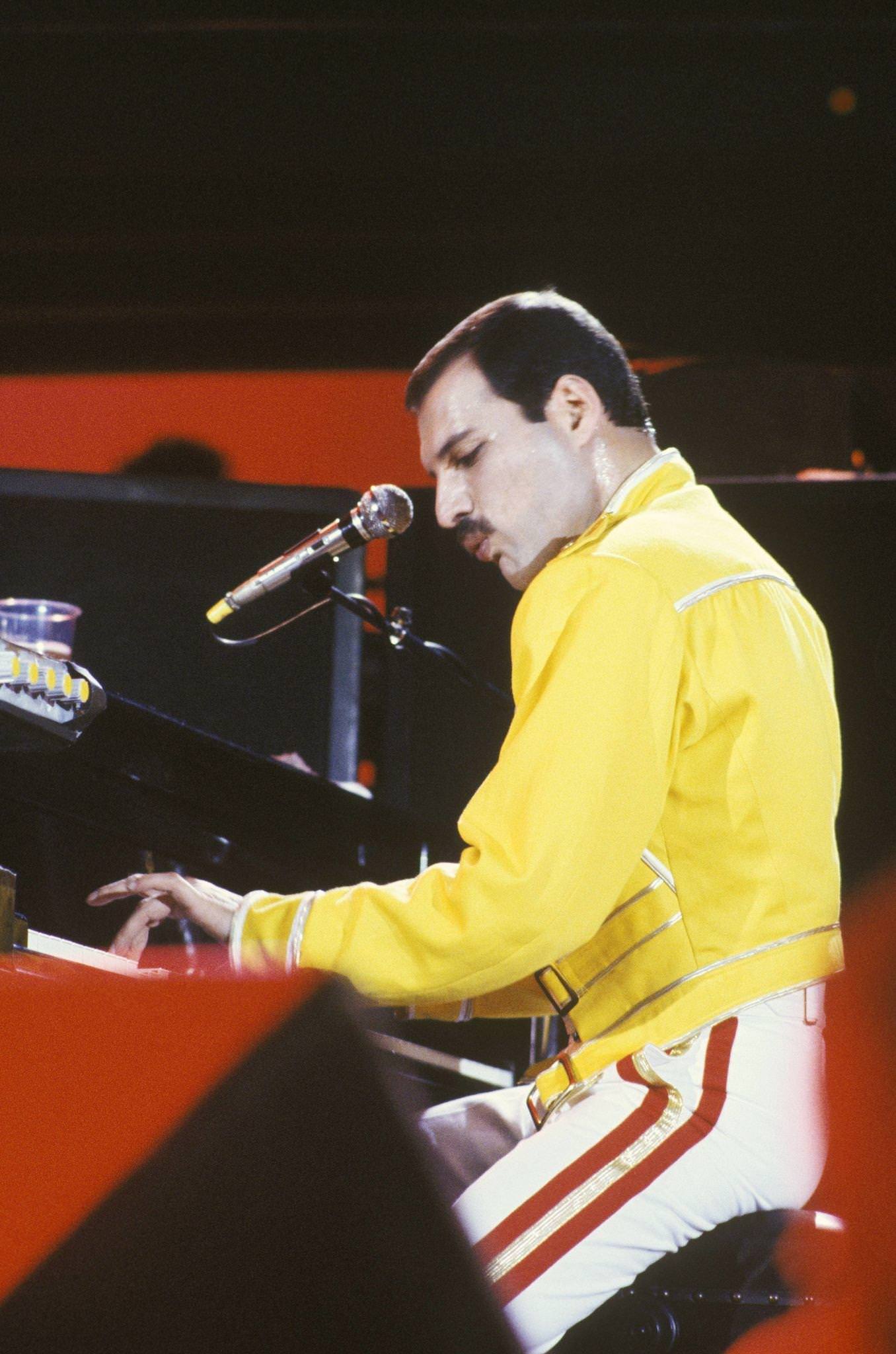 Freddie Mercury Of Queen Playing Piano At Wembley Stadium, 1986.