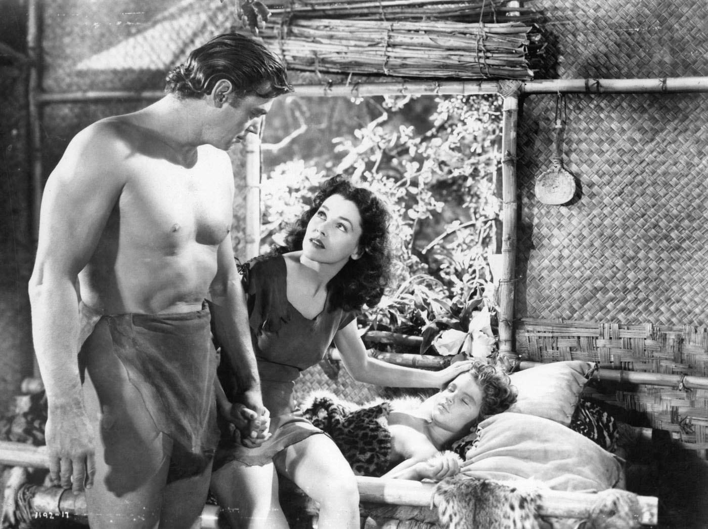&Amp;Quot;Tarzan'S Secret Treasure,&Amp;Quot; 1941: Johnny Weissmuller And Maureen O'Sullivan Watch Over Sick Johnny Sheffield.