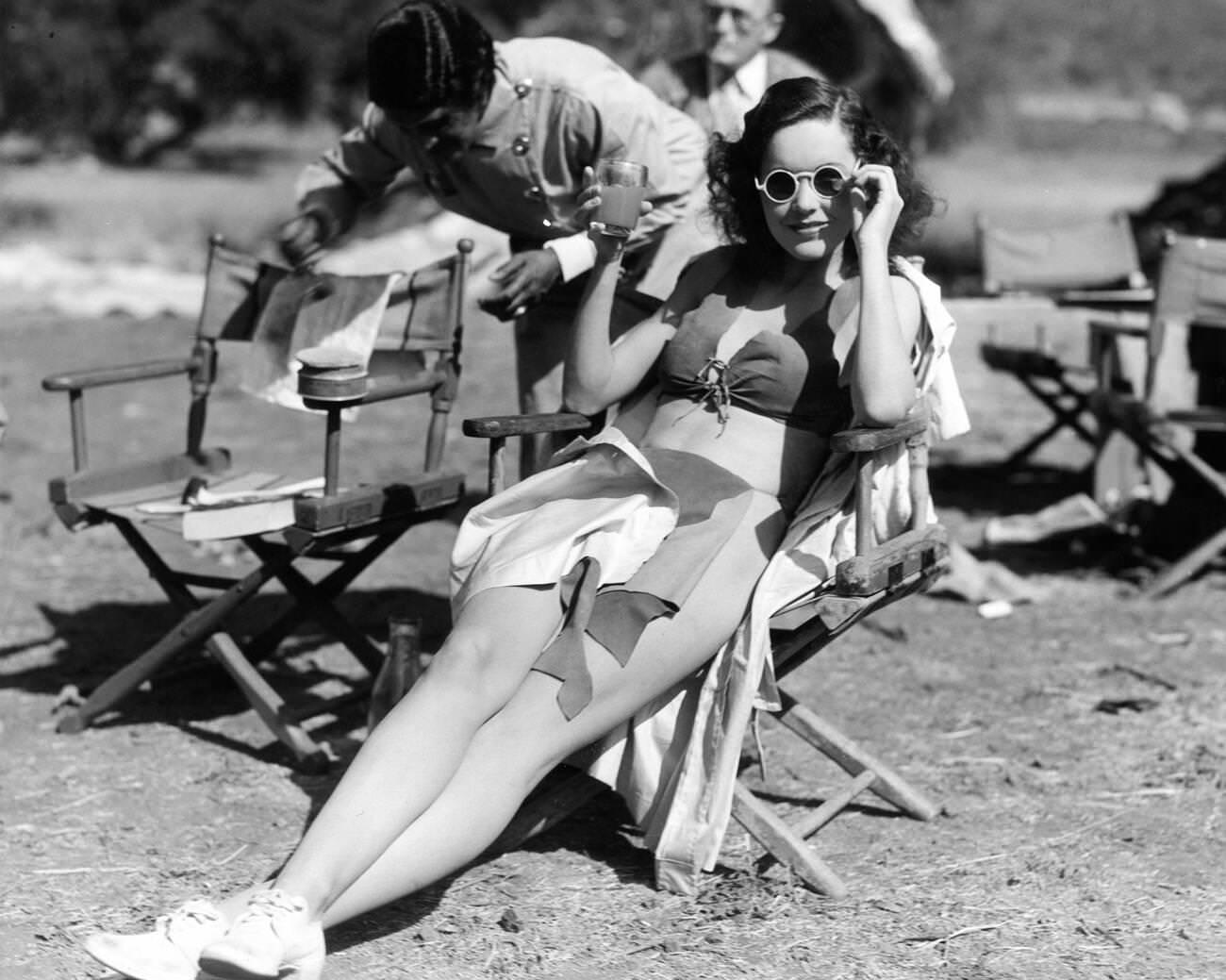 Maureen O'Sullivan As Jane Parker On Set, Wearing Sunglasses With A Make-Up Woman During Filming Of &Amp;Quot;Tarzan And His Mate&Amp;Quot; (1934)