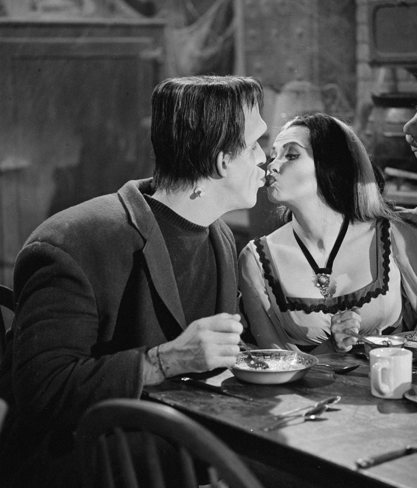 Fred Gwynne (Herman) Kisses Yvonne De Carlo (Lily) In 'The Munsters,' 1964.