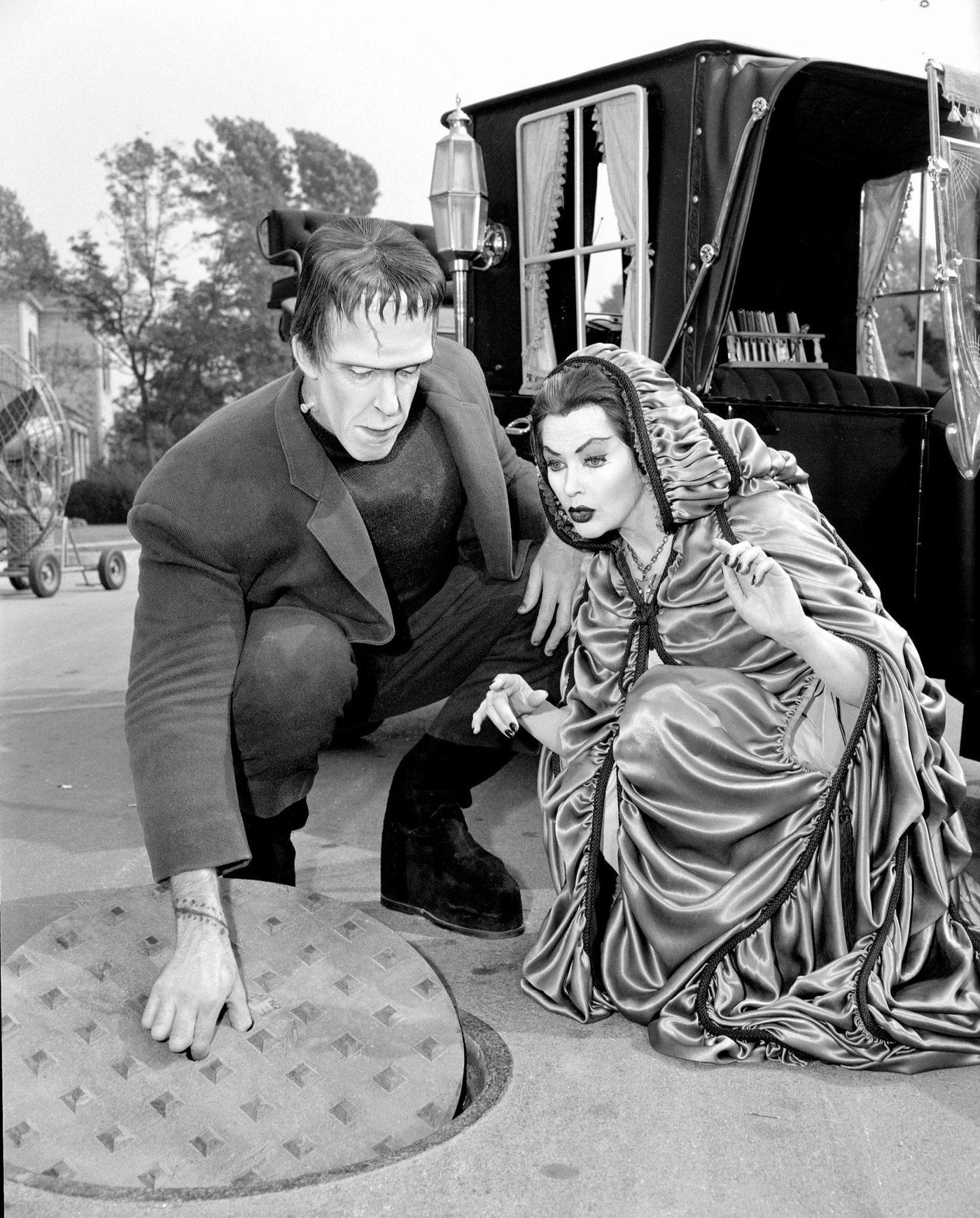 Fred Gwynne And Yvonne Decarlo In 'The Munsters' Episode 'Family Portrait,' October 16, 1964.