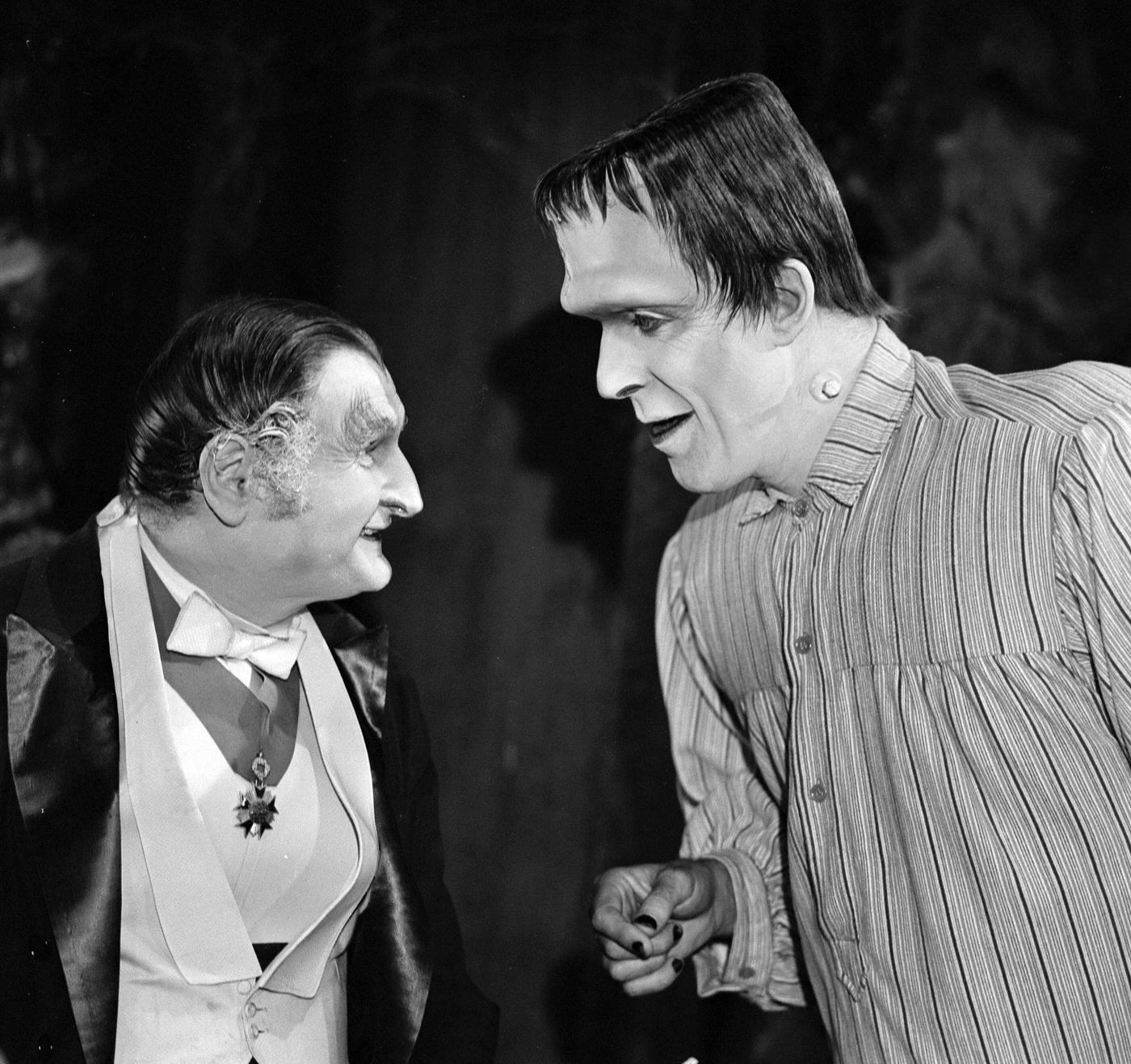 Al Lewis (Grandpa) Talks To Fred Gwynne (Herman) In 'The Munsters' Episode 'The Treasure Of Mockingbird Heights,' October 22, 1965.