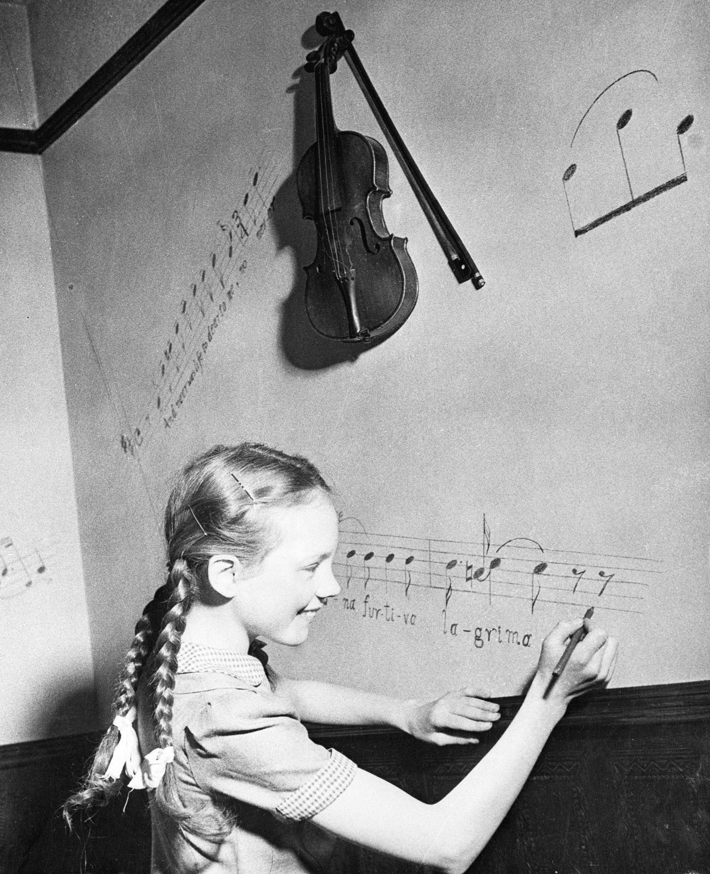 Julie Andrews Writing Music On Wall, 1947.