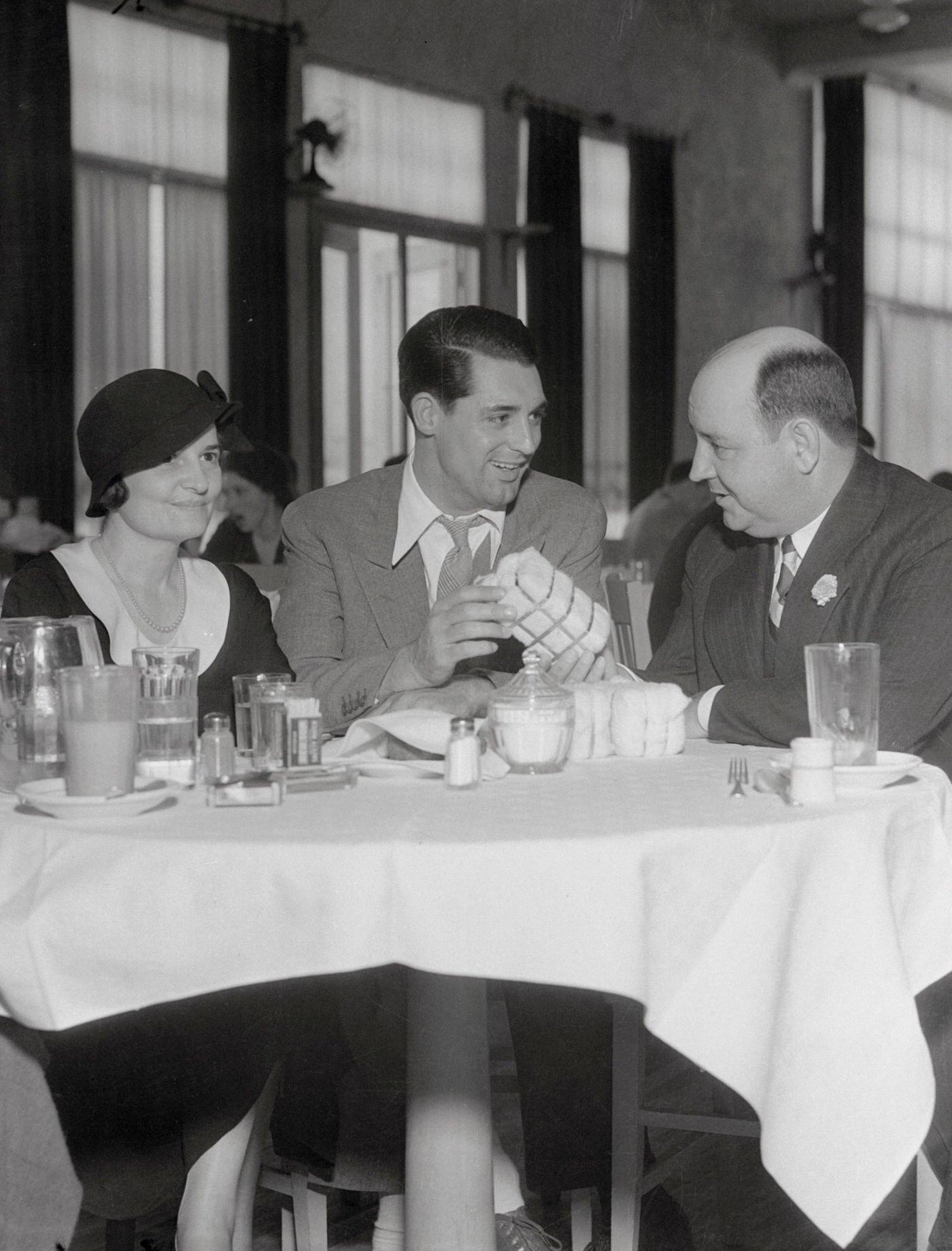 Cary Grant Hosts Russell Clark And Wife, Who Visit The Paramount Studios During The Filming Of 'Madame Butterfly,' 1932.