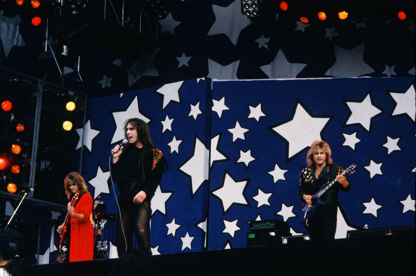 Gorky Park Performing Live At The Moscow Music Peace Festival 1989, Featuring Alexander 'Big Sasha' Minkov On Bass, Nikolai Noskov On Vocals, And Yan Yanenkov On Guitar, 1989.