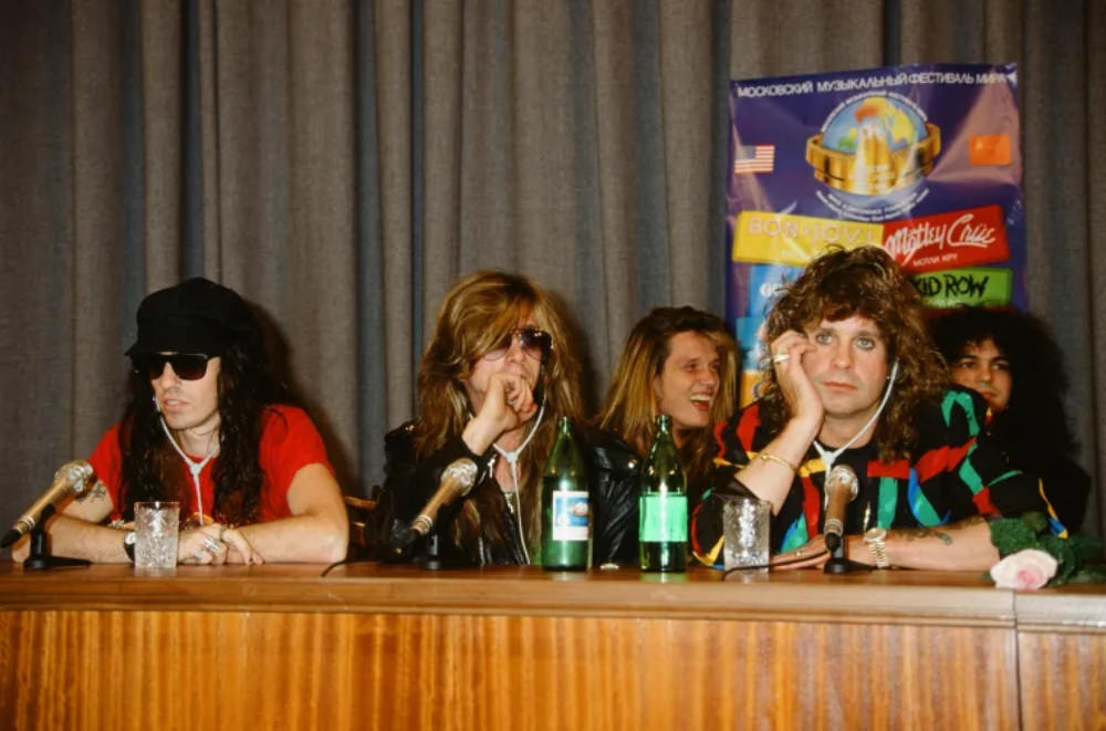 Skid Row’s Rachel Bolan And Dave “Snake” Sabo Join A Bored-Looking Ozzy At The Moscow Music Peace Festival Press Conference, While Sebastian Bach And Cinderella’s Fred Coury Have A Laugh Behind Them.