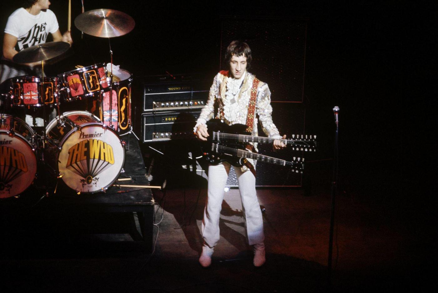 Pete Townshend Plays A Gibson Eds-1275 Twin Neck Guitar During A Performance, October.