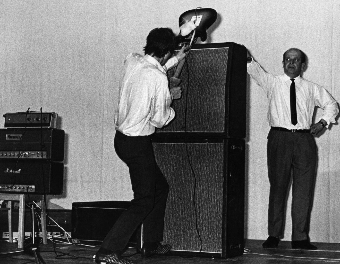 Pete Townshend Smashes His Guitar Against An Amplifier At The Jaguar Club In Germany, April.