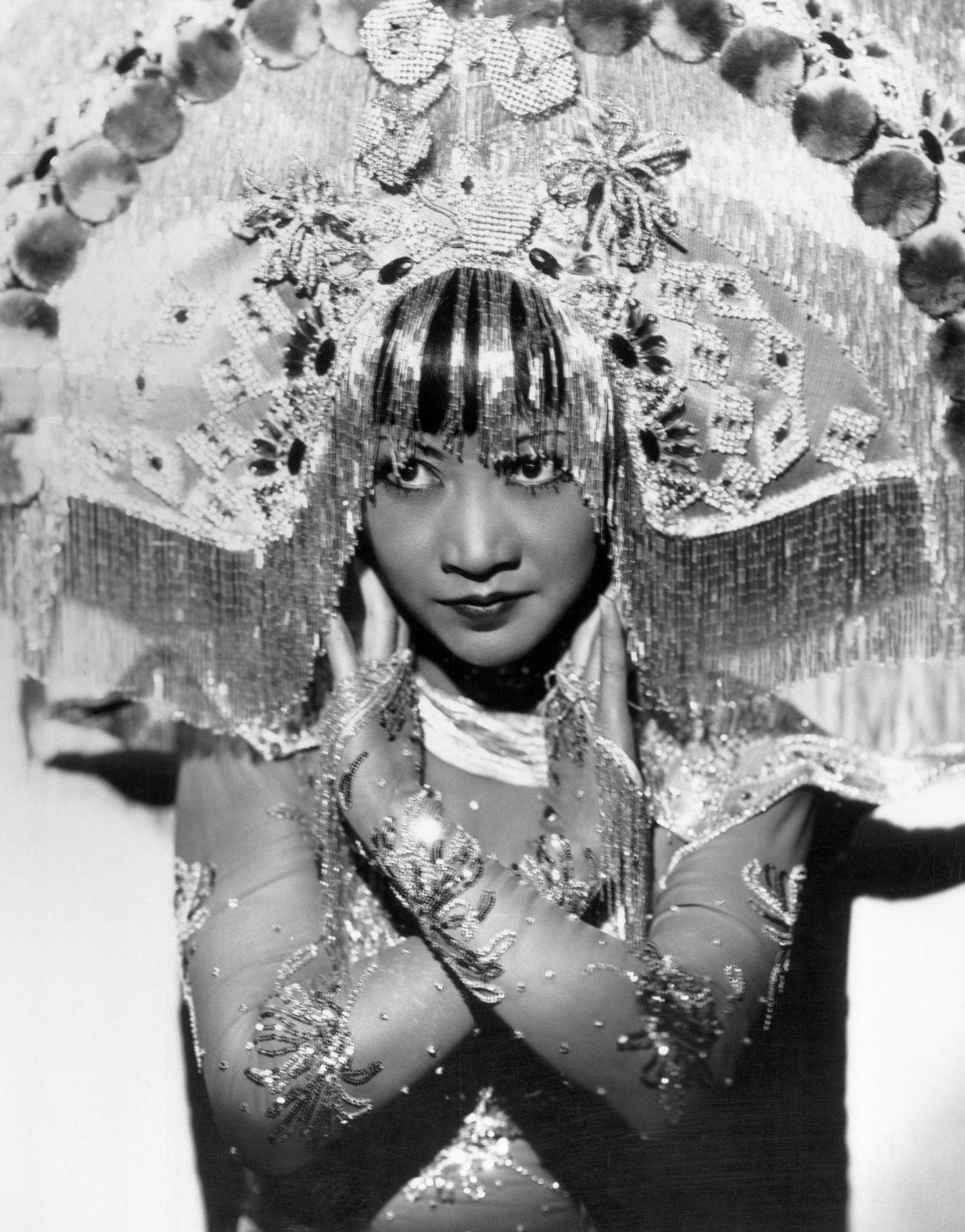 Anna May Wong In Costume With Headdress In 'Daughter Of The Dragon', 1931.