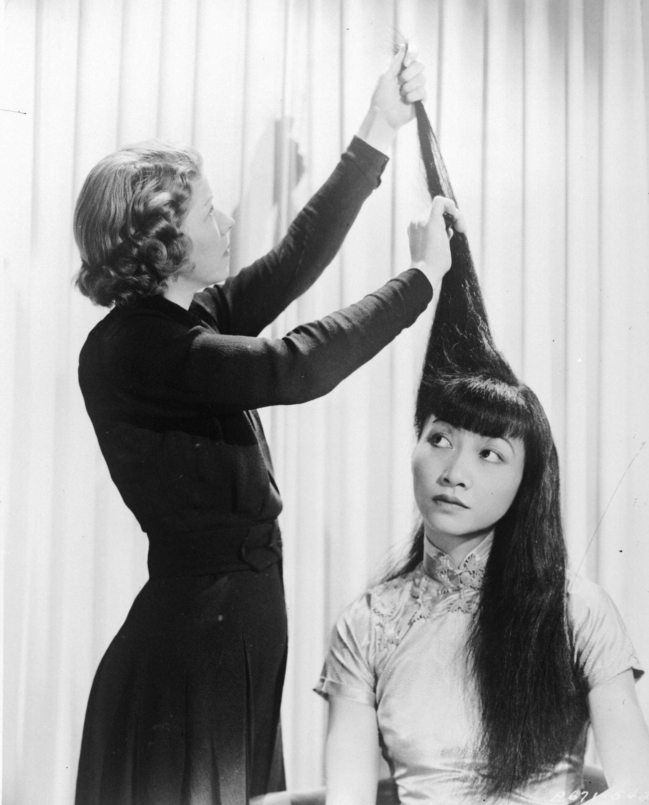 Anna May Wong Having Her Hair Done, Circa 1930.