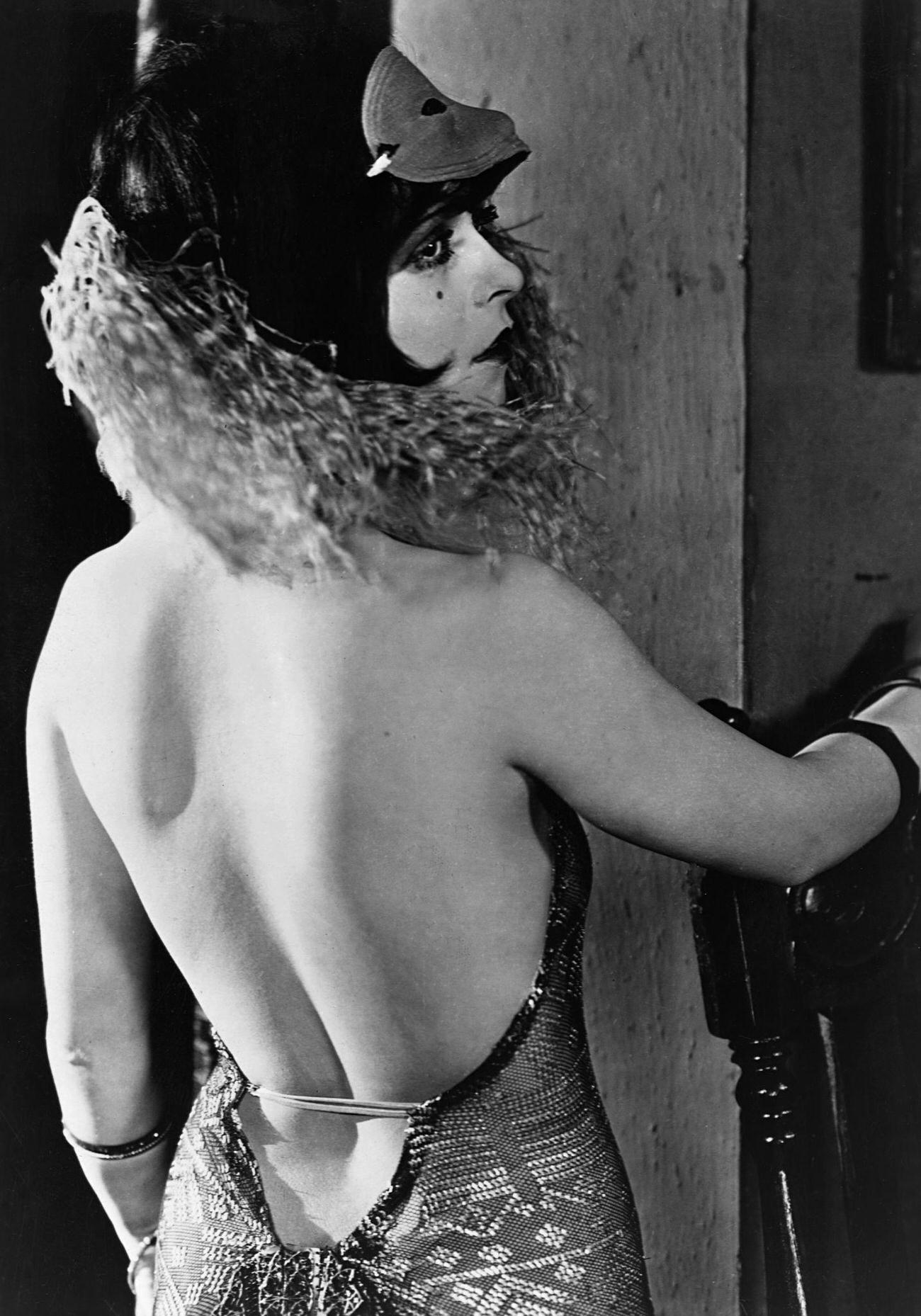 Clara Bow In A Feather Boa And Backless Dress, 1927.
