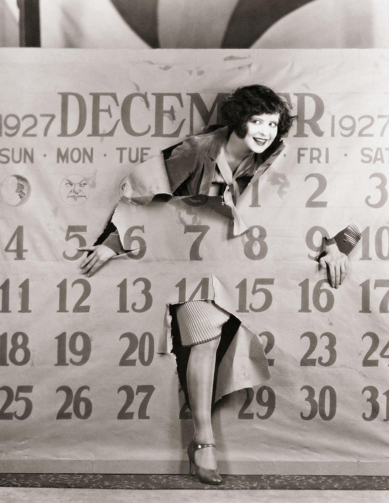 Clara Bow Poking Through A Giant Calendar, 1920S