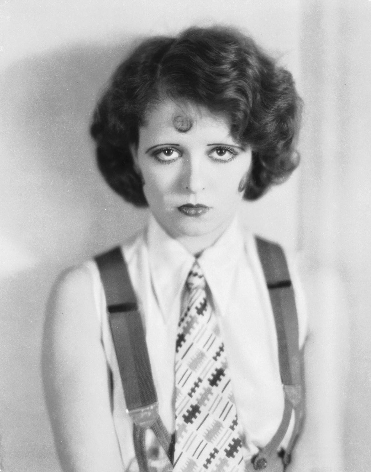 Clara Bow In A Masculine Style With Sleeveless Shirt, Tie, And Braces, 1927.
