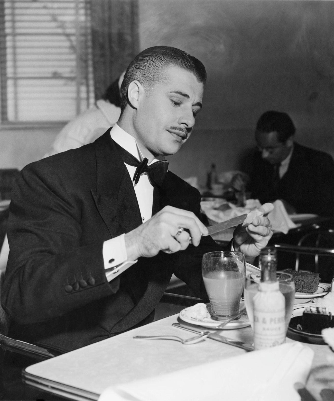 Don Ameche In A Restaurant, 1938.