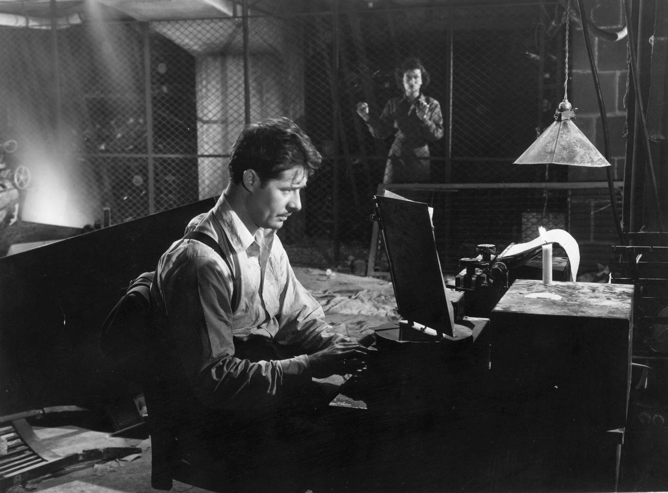 Don Ameche And Joan Bennett Star In 'Confirm Or Deny', A Romantic Wartime Drama Directed By Archie Mayo, 1941.