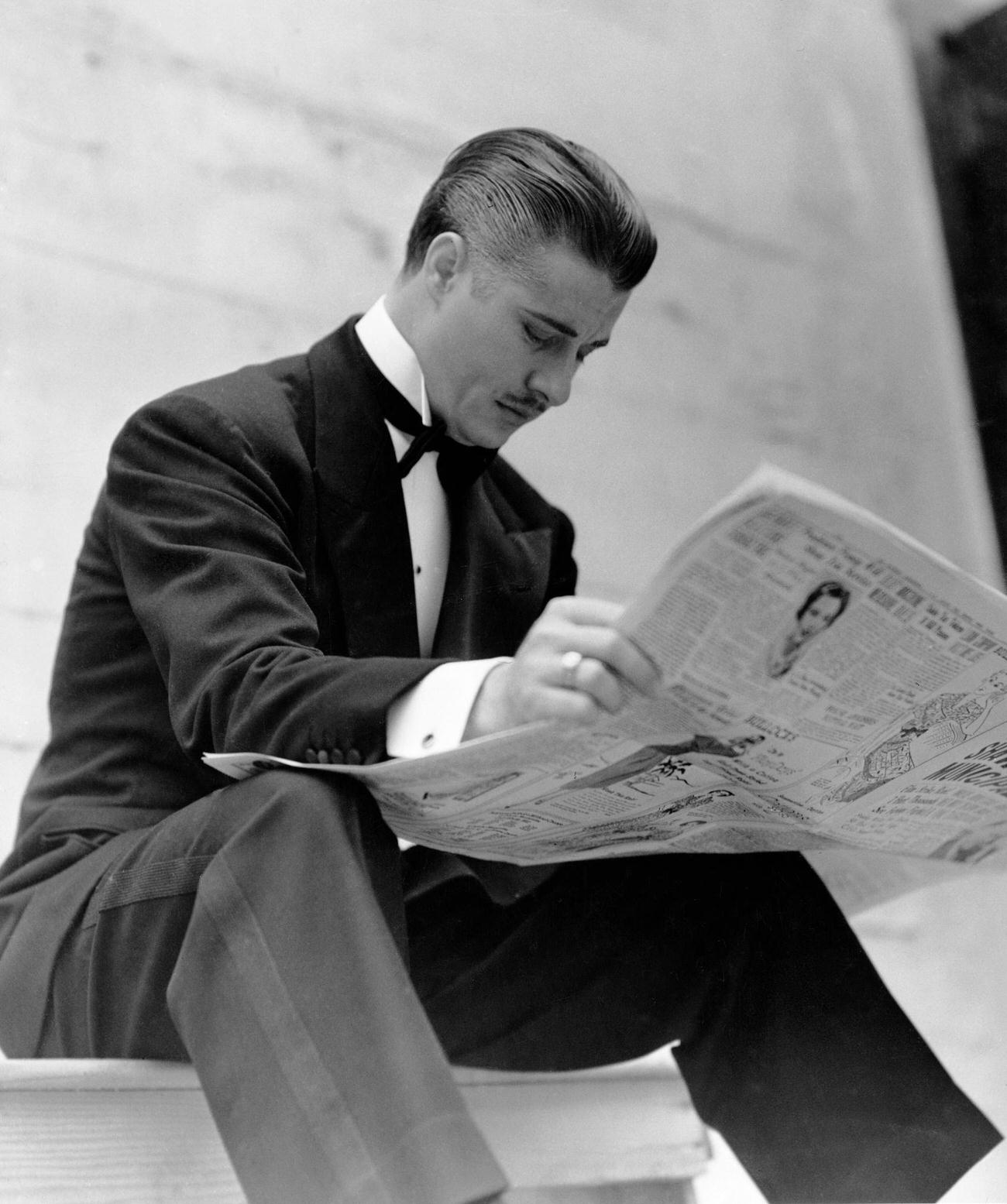 Don Ameche Reading The Newspaper In Formalwear, May 1955.