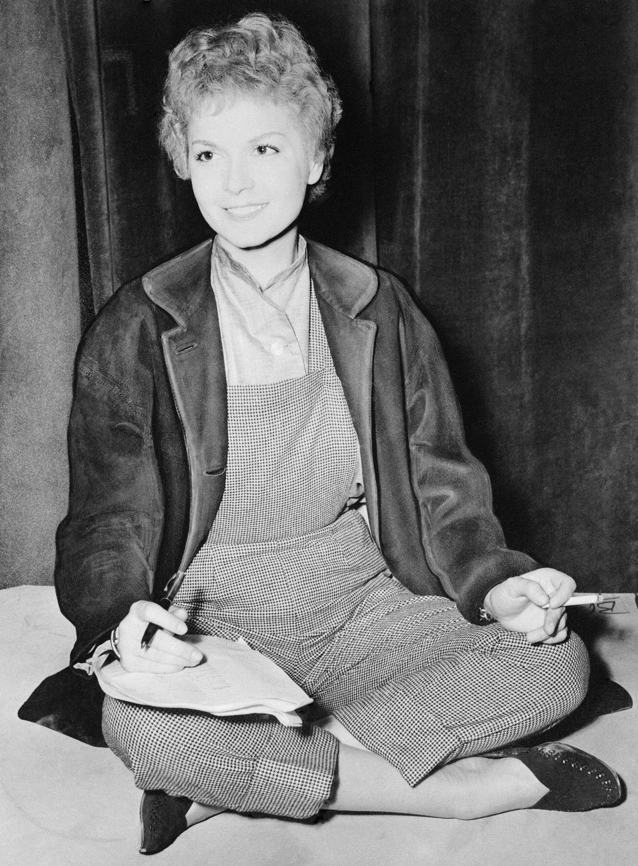 Eva Bartok Studying Her Script During Filming In London.