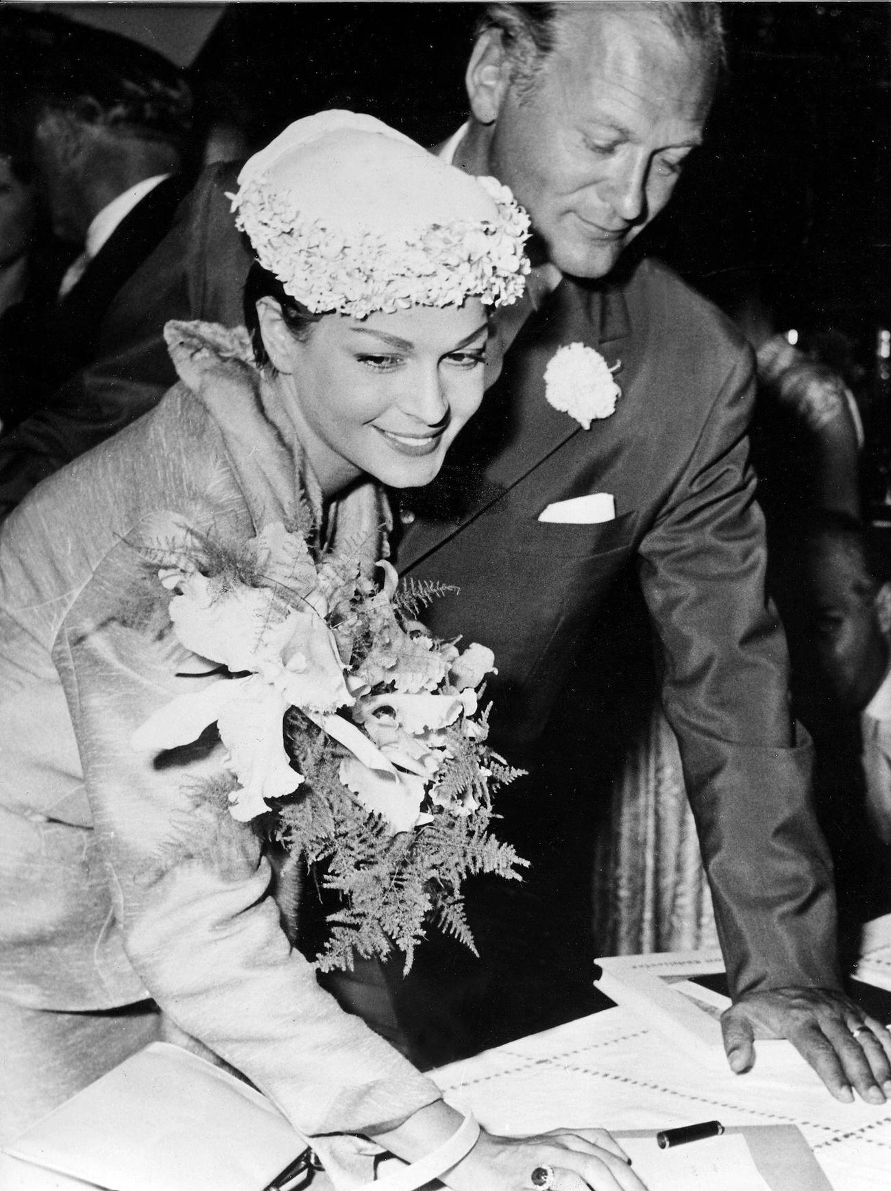 Curd Jürgens And Eva Bartok Signing Marriage Certificate, August 13, 1955.