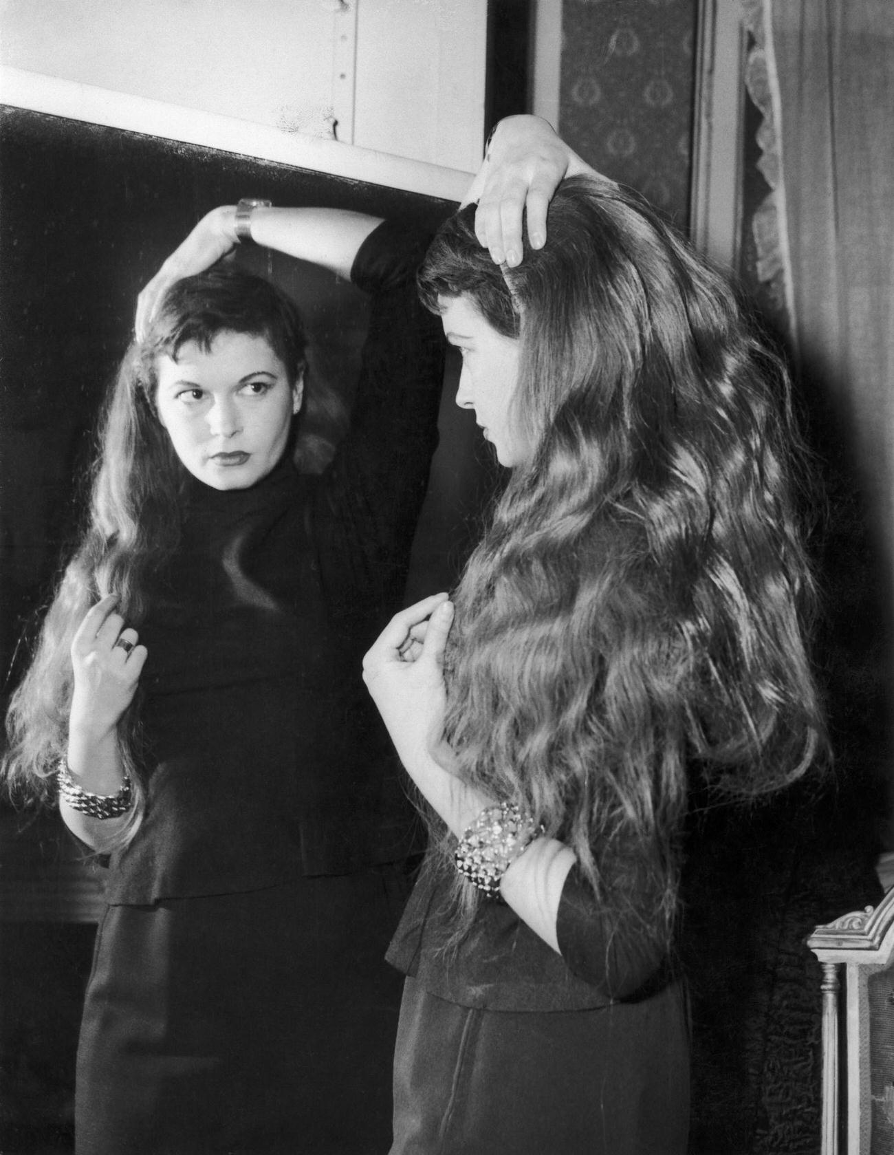 Eva Bartok Trying A Wig.