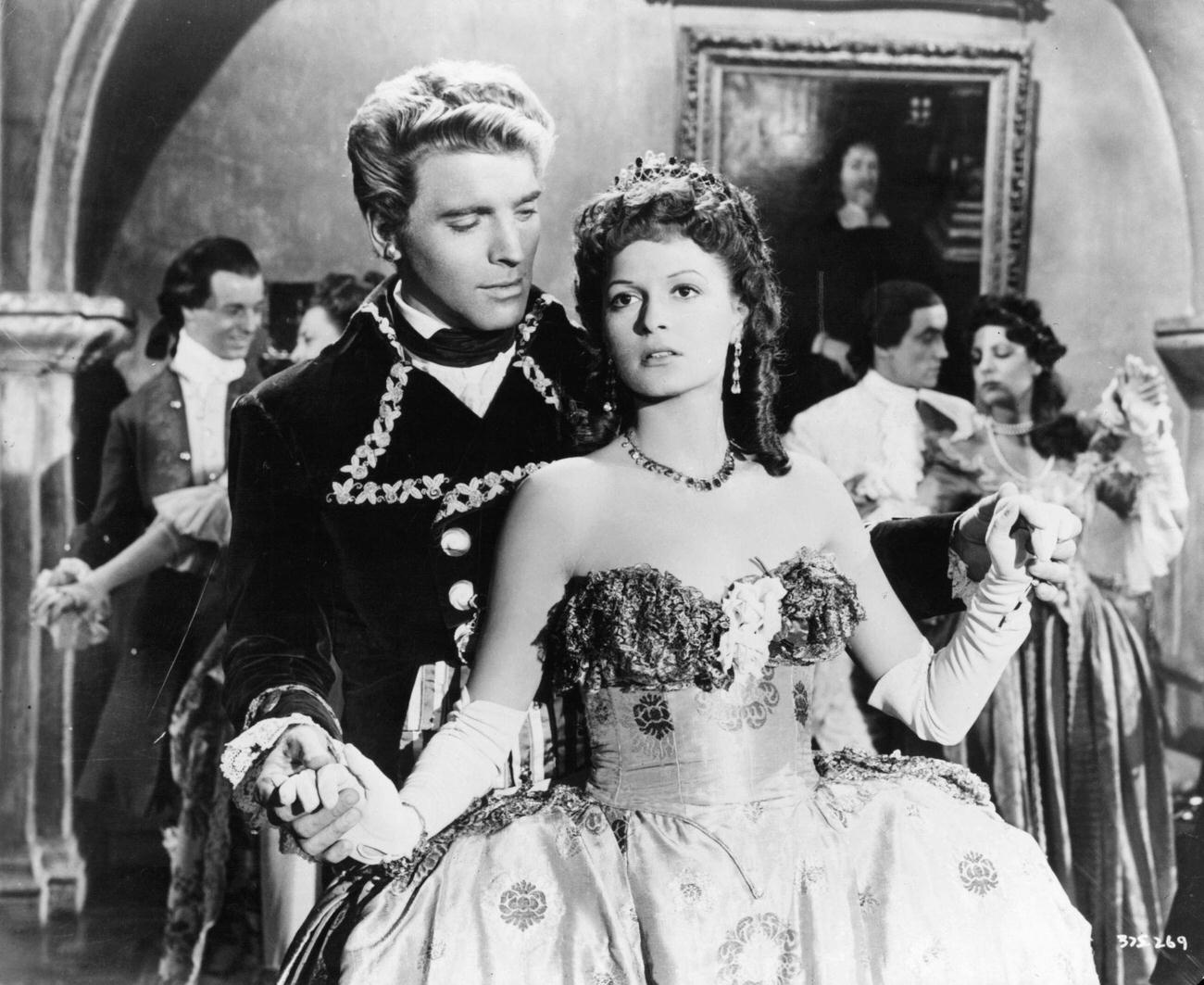 Burt Lancaster Holding Eva Bartok'S Hands In 'The Crimson Pirate', 1952.