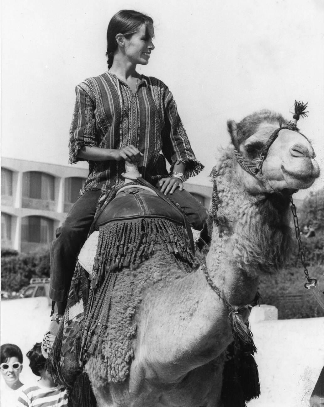 Geraldine Chaplin Riding A Camel In Israel, July 15, 1971.