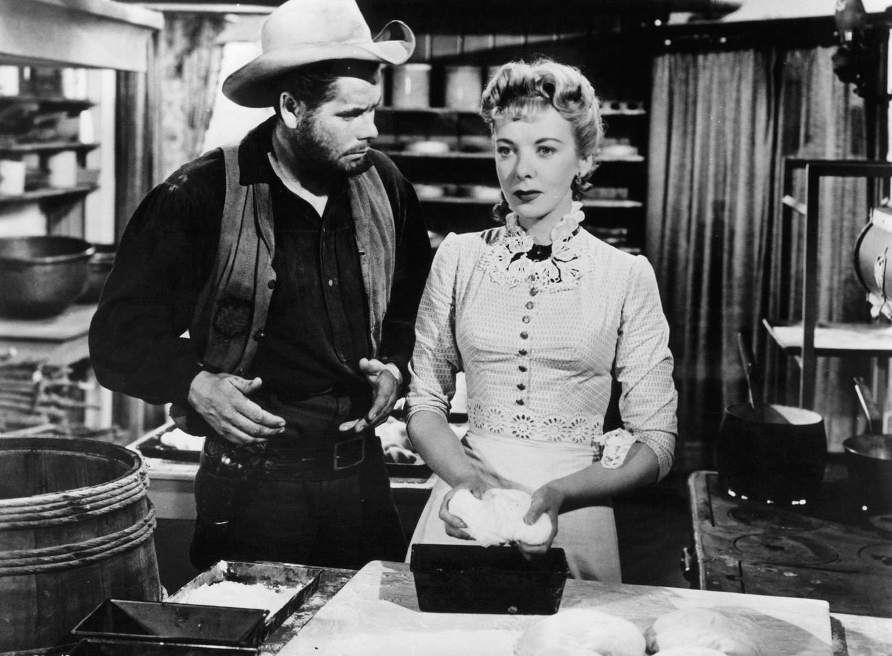 Glenn Ford Talking To Ida Lupino In 'Lust For Gold', 1949.