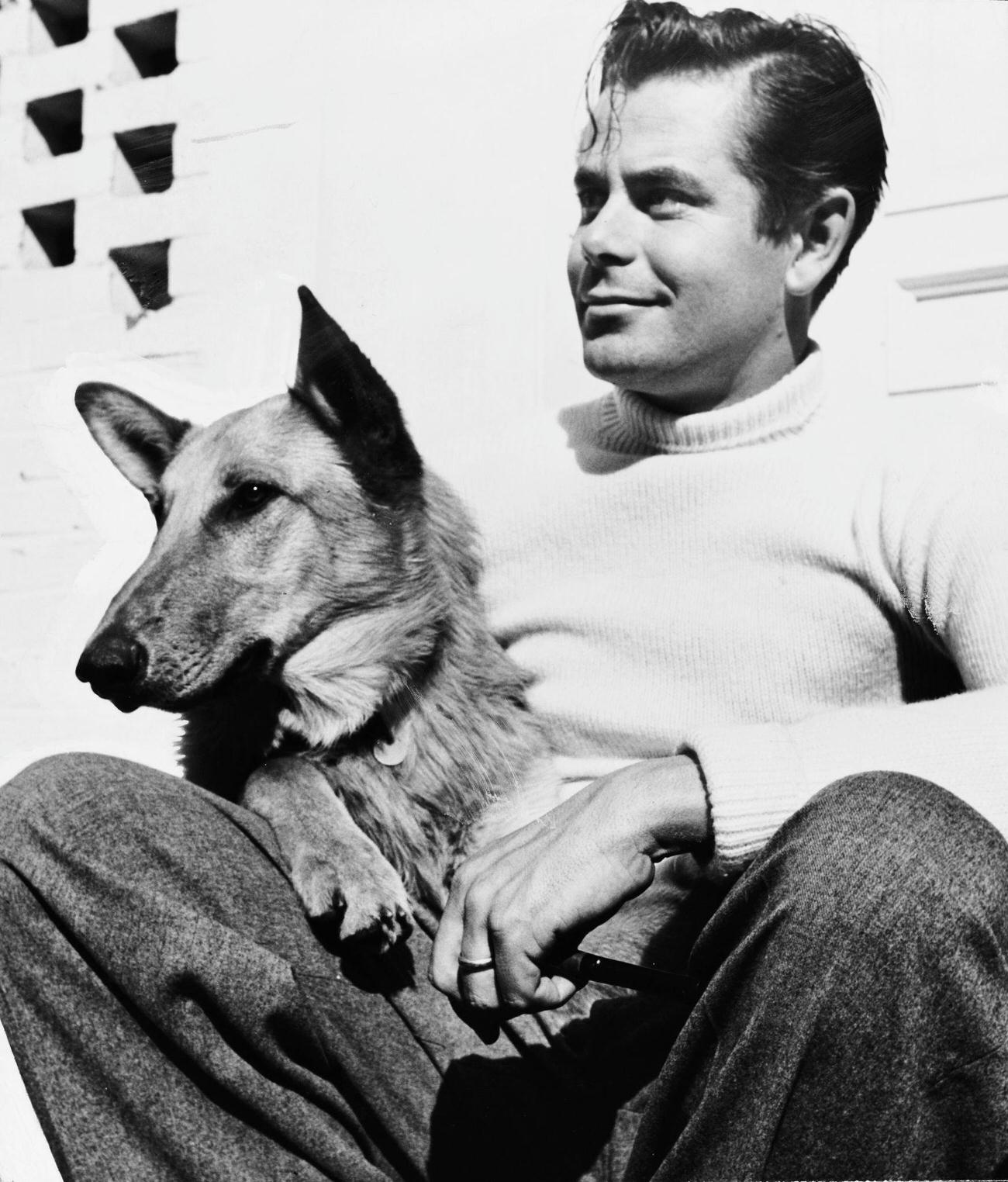 Glenn Ford With A Dog, Circa 1950.