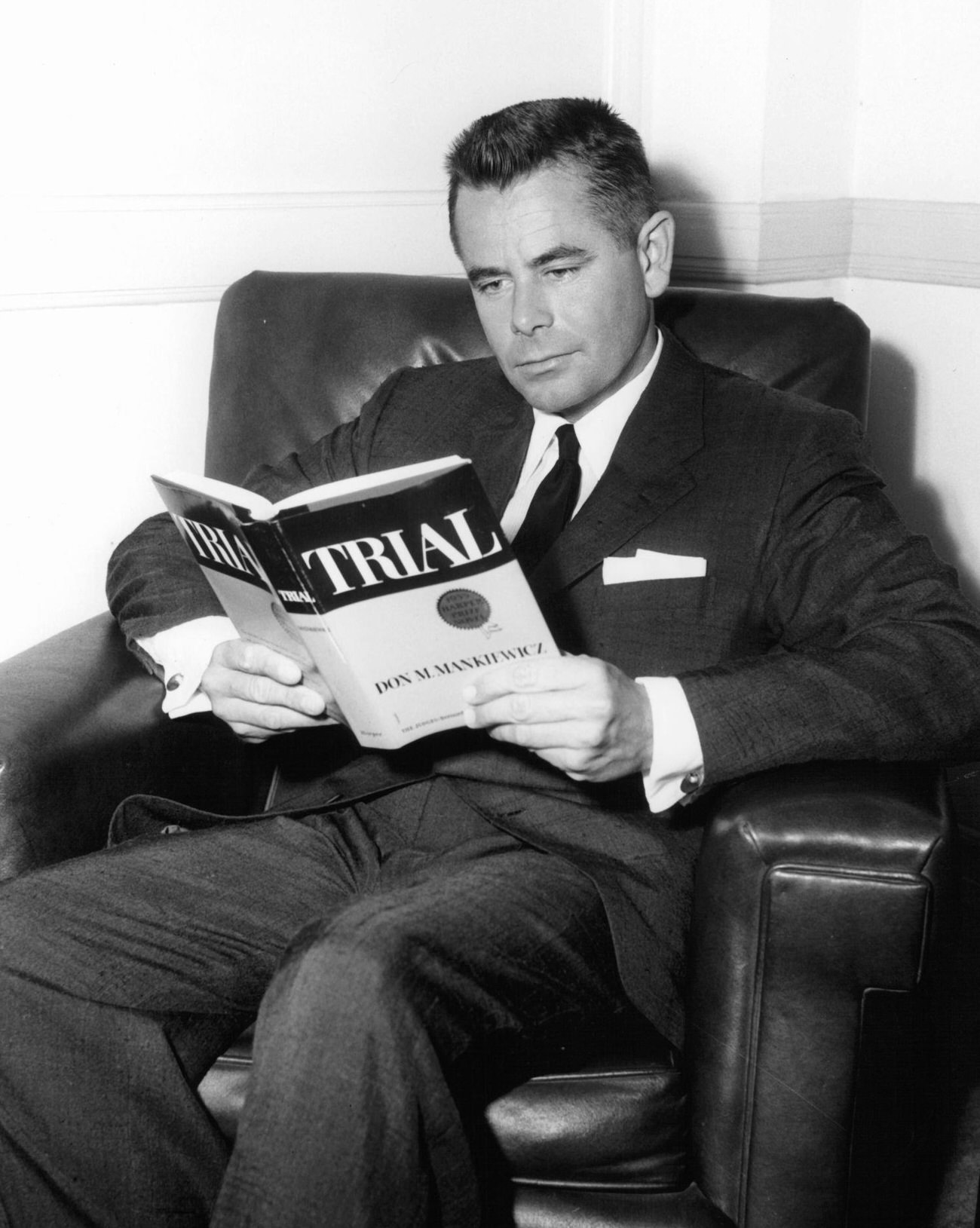 Glenn Ford Reading A Book Off-Camera From 'Trial', 1955.