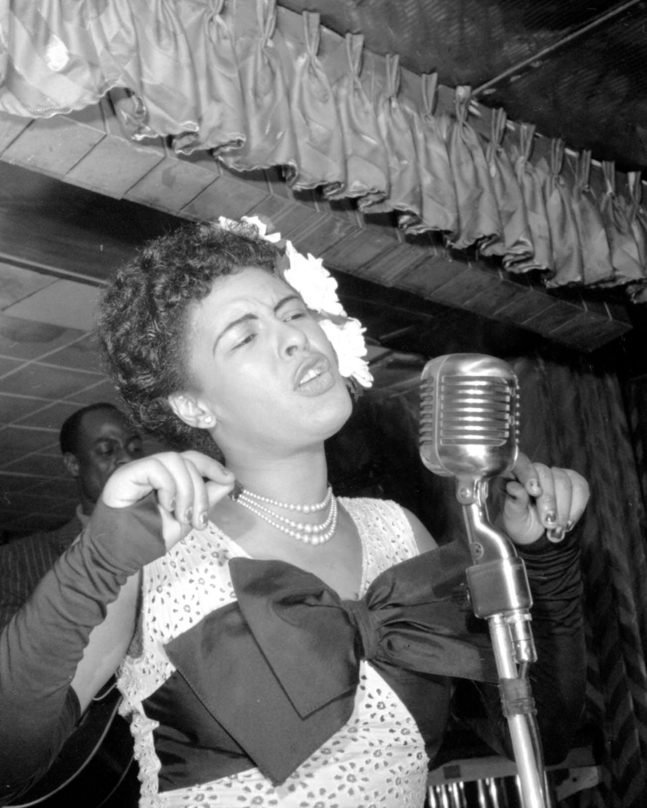 Jazz Singer Billie Holiday Performing At The Club Downbeat, New York City, February 1947.