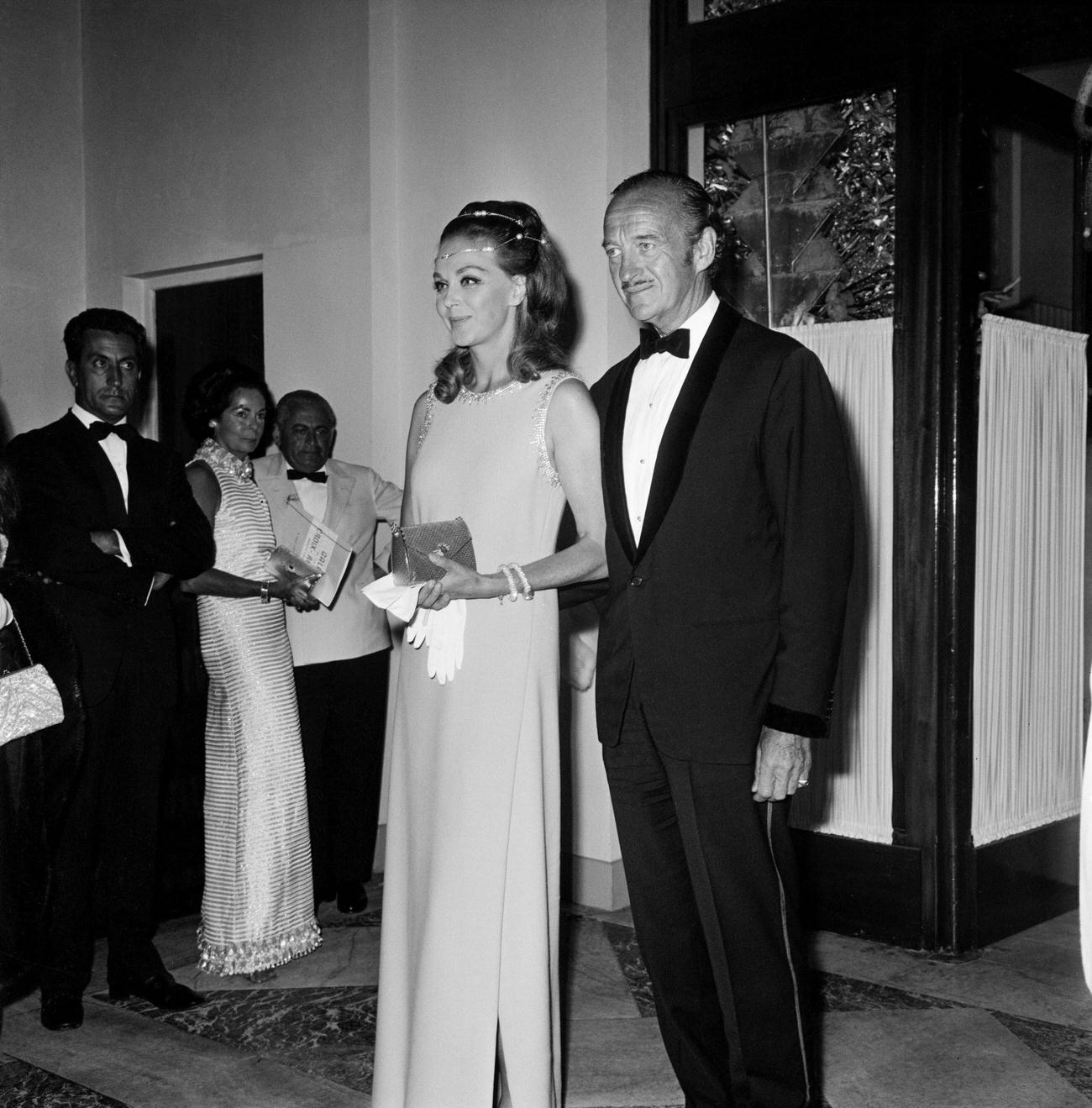 Hjördis Genberg With Her Husband David Niven At The Red Cross Ball In Monte-Carlo, Monaco, August 9, 1969.