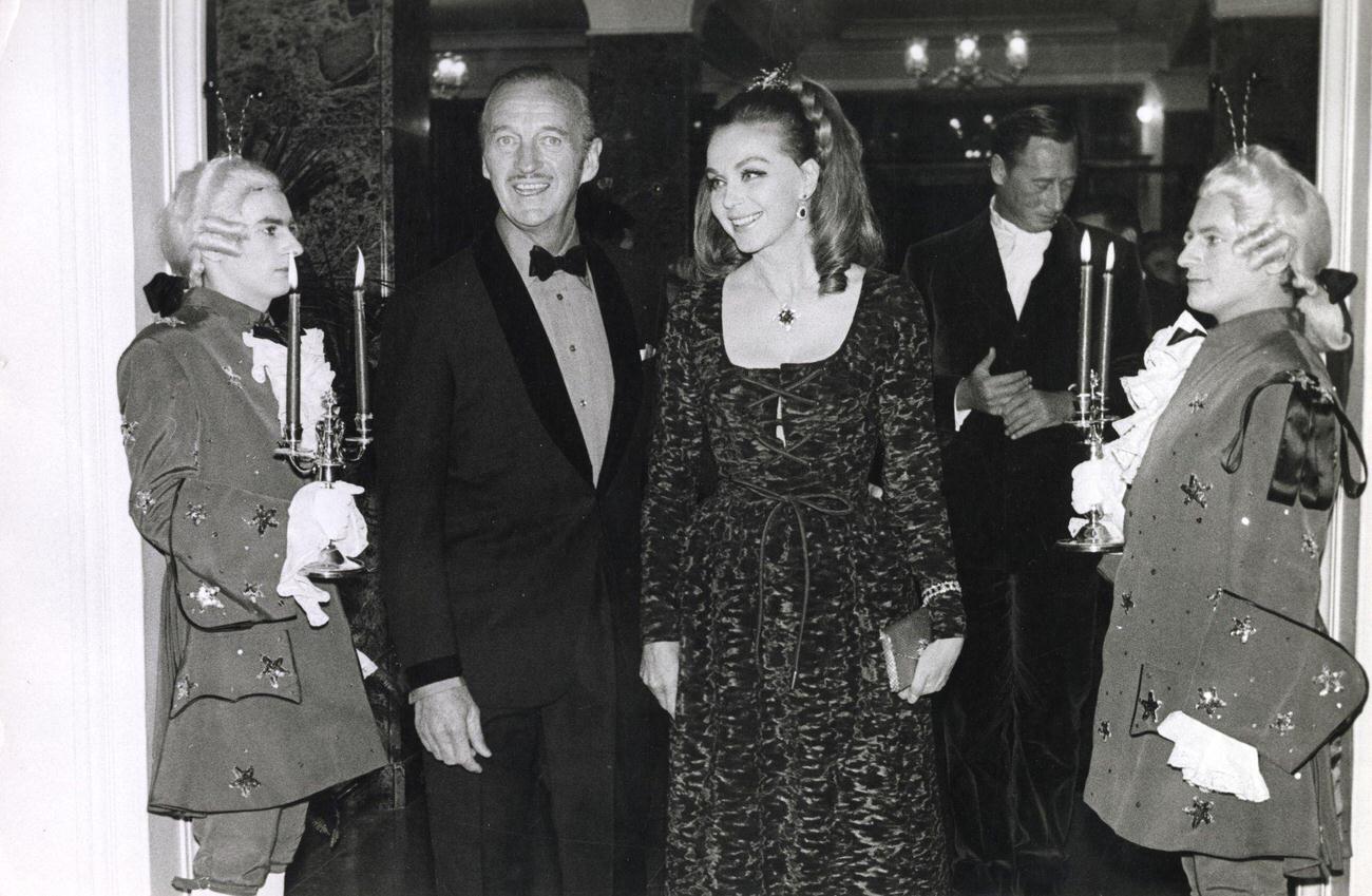 David Niven And His Wife Hjördis Genberg At A Party In London In The 1960S.