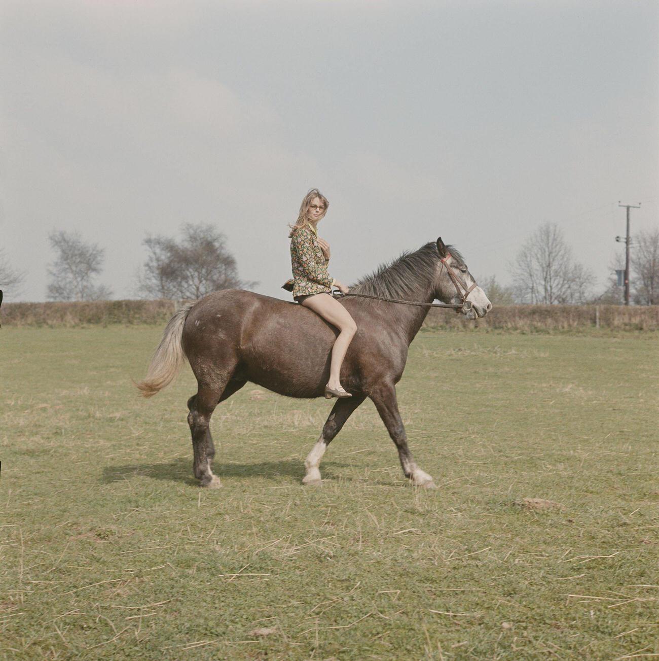 Julie Christie Riding A Horse In A Field For 'Far From The Madding Crowd', 1967.