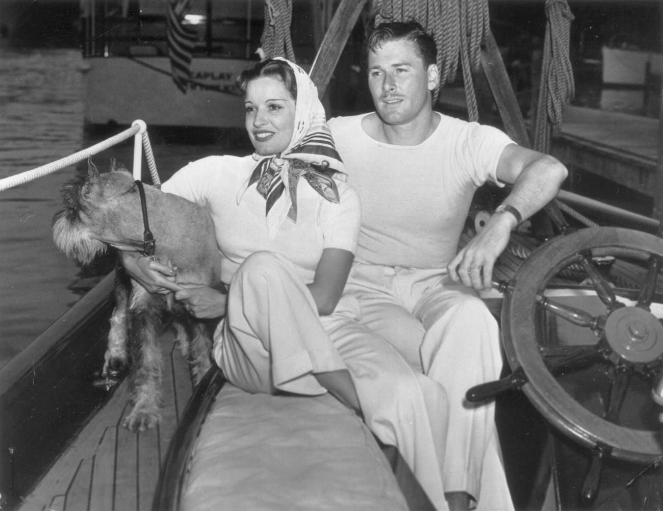 Errol Flynn, Lili Damita, And Their Dog On A Yacht, Circa 1942.