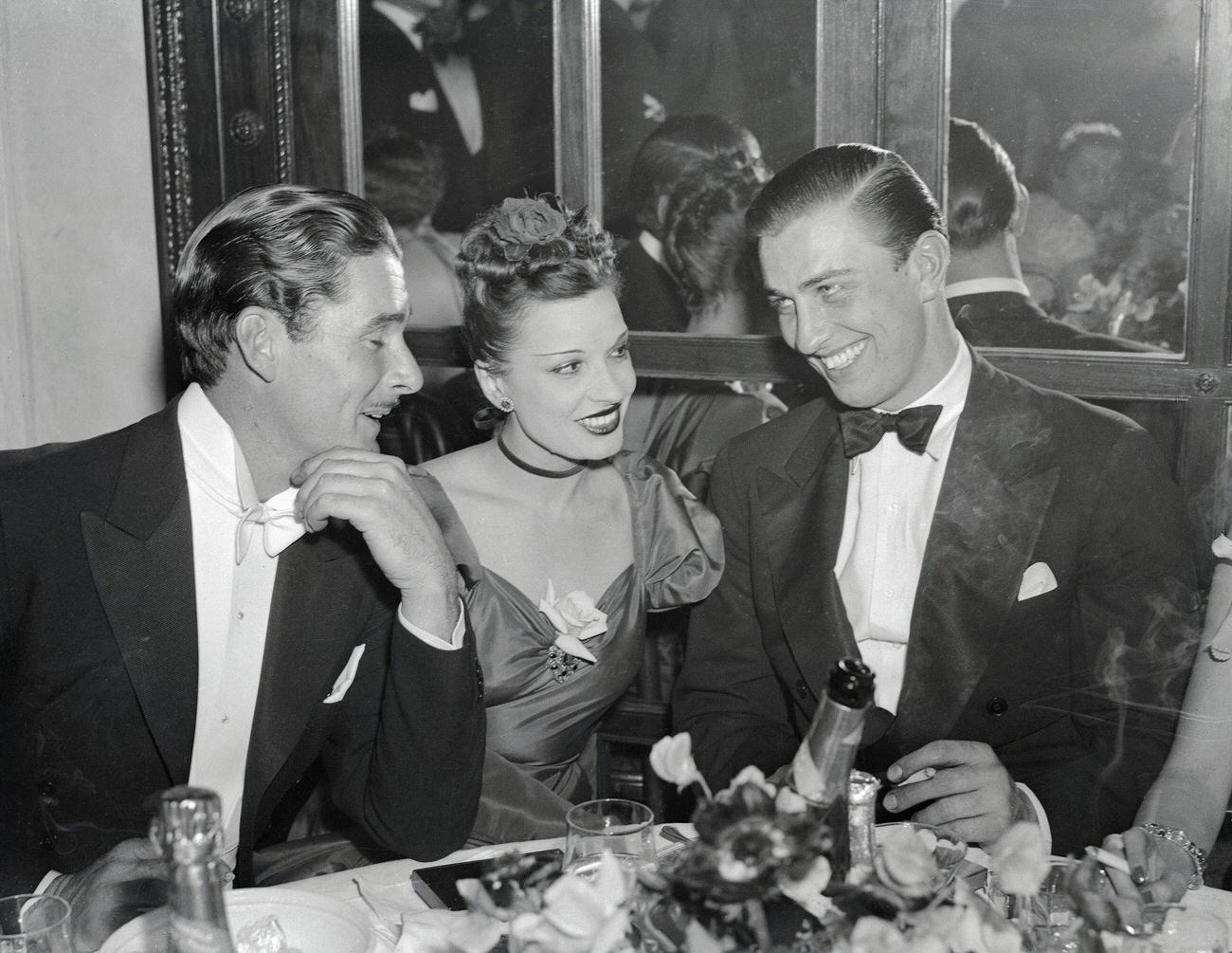 Errol Flynn, Lili Damita, And Franklin D. Roosevelt, Jr. At The Gold Plate Breakfast.