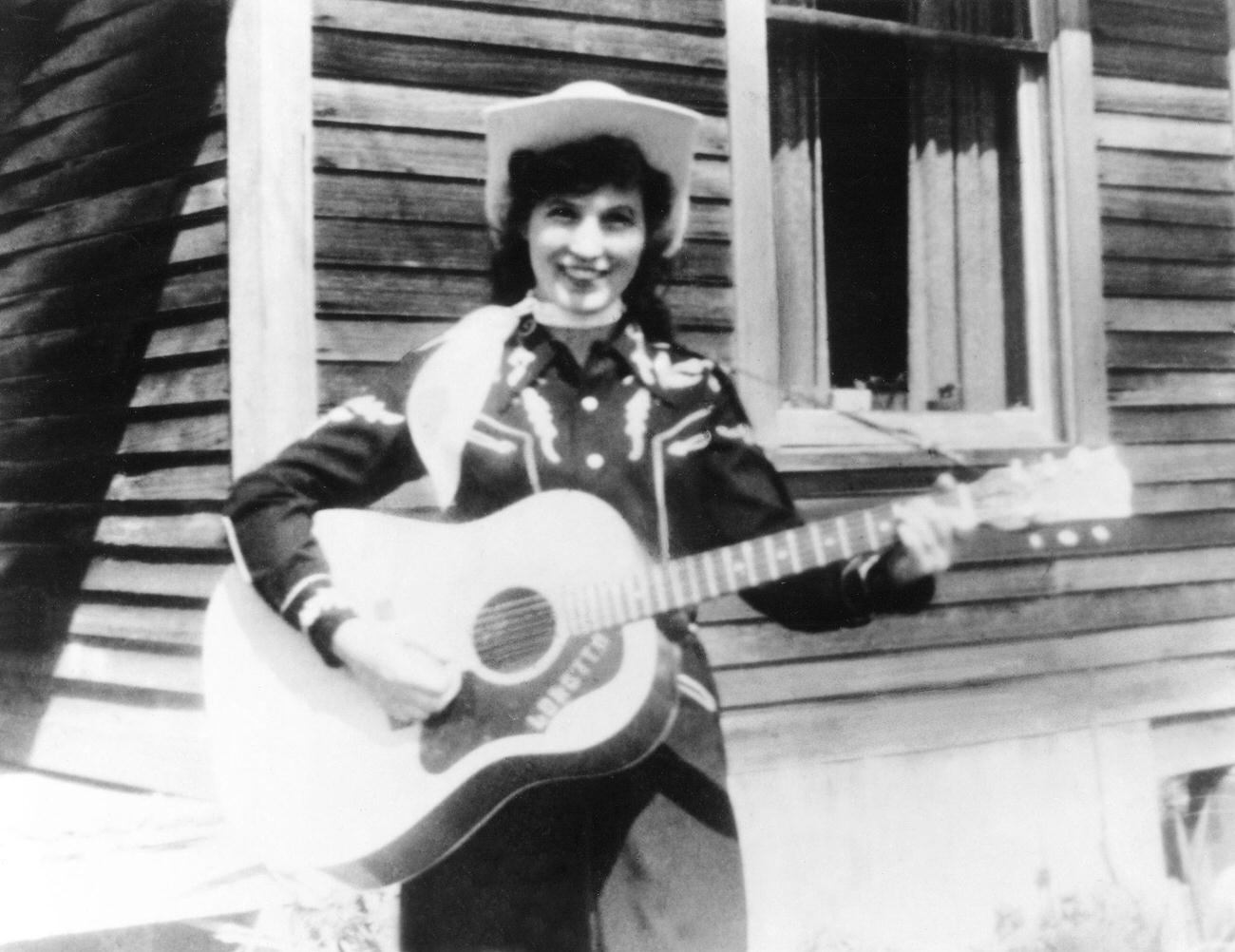 Loretta Lynn Poses For A Portrait With Her Acoustic Guitar, Circa 1960.