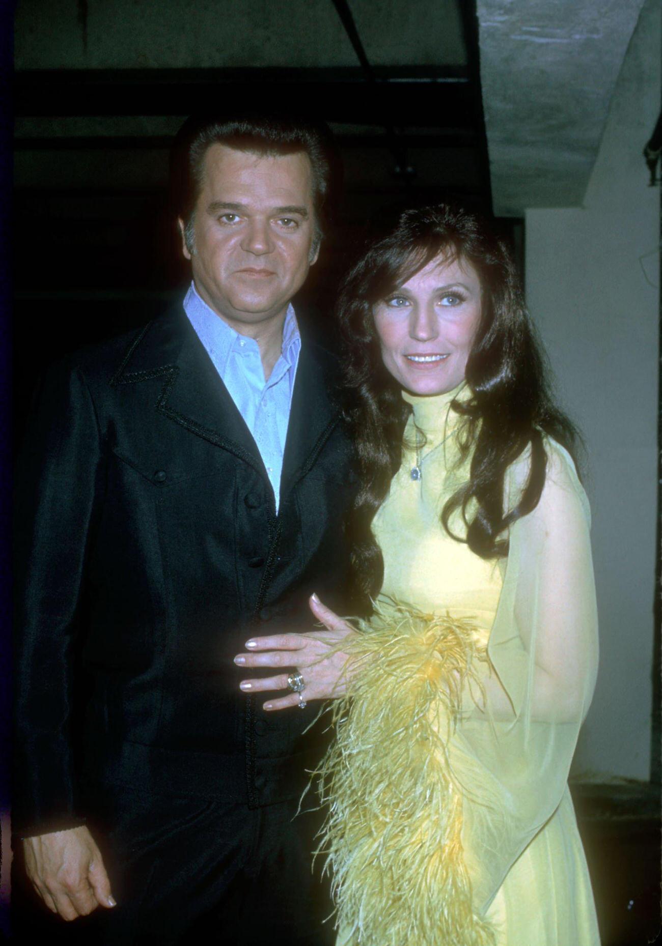 Loretta Lynn And Conway Twitty Pose For A Portrait At The 2Nd Annual American Music Awards, February 18, 1975, Santa Monica, California.