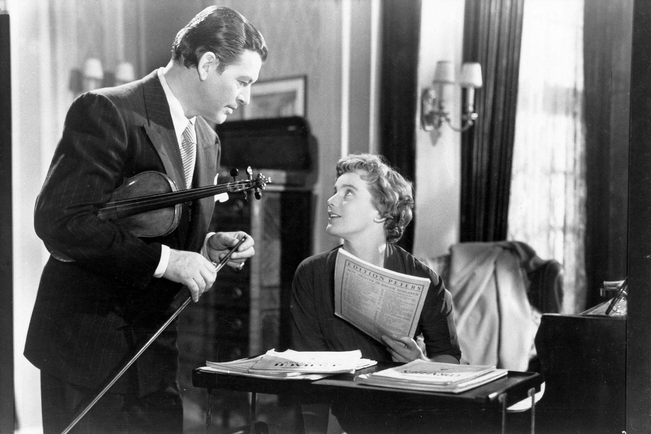 Maria Schell With Heinz Oestergaard Studying Dress Sketches, 1954.