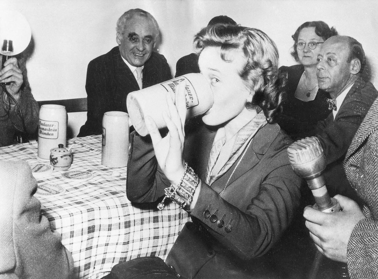 Maria Schell Drinking From A Stein At The Munich Salvator-Anstich, 1954.